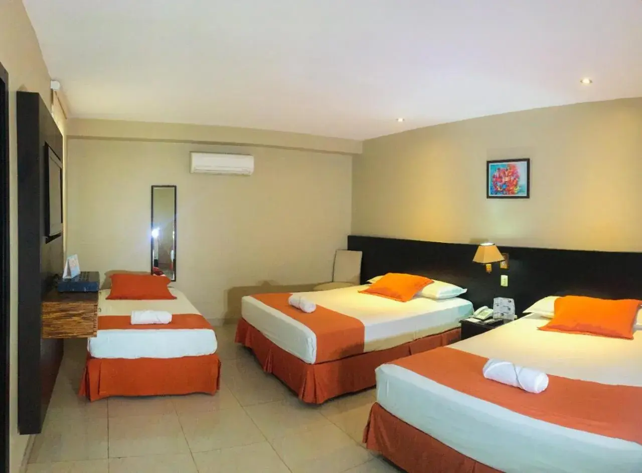 Triple Room in Hotel Los Almendros Triple Room in Hotel Los Almendros