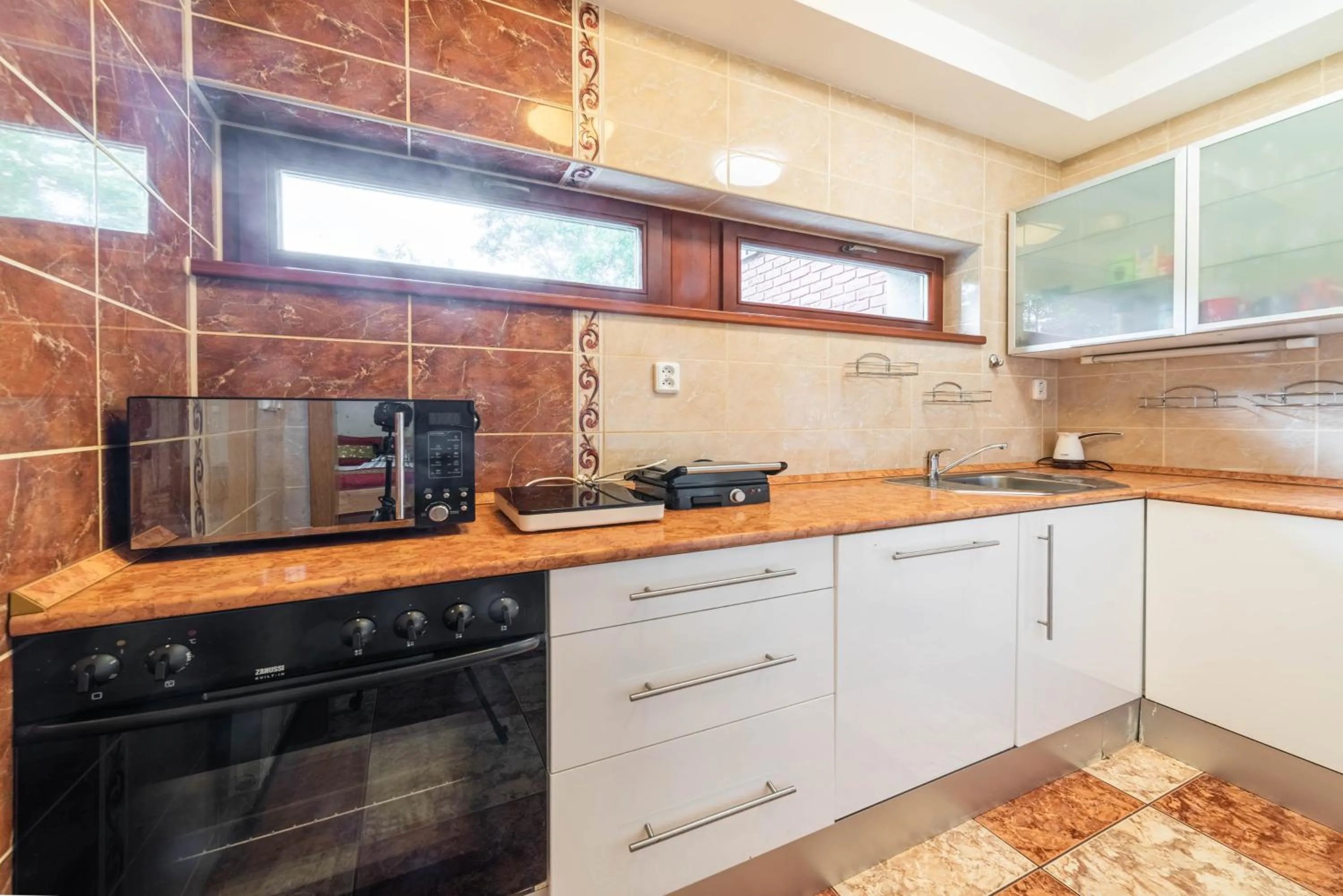 Kitchen or kitchenette in Apartmán blizko centra Prahy