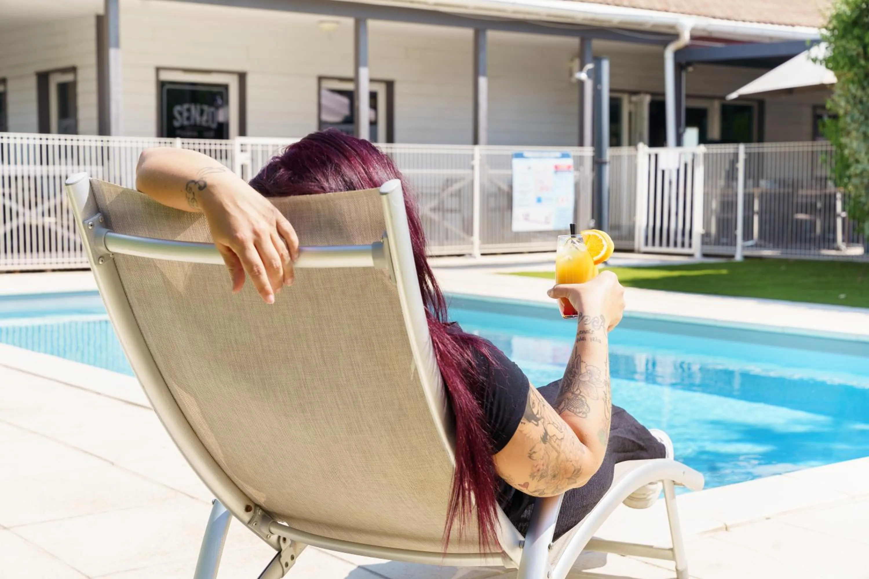 Swimming pool in Brit Hotel Confort Manosque Cadarache