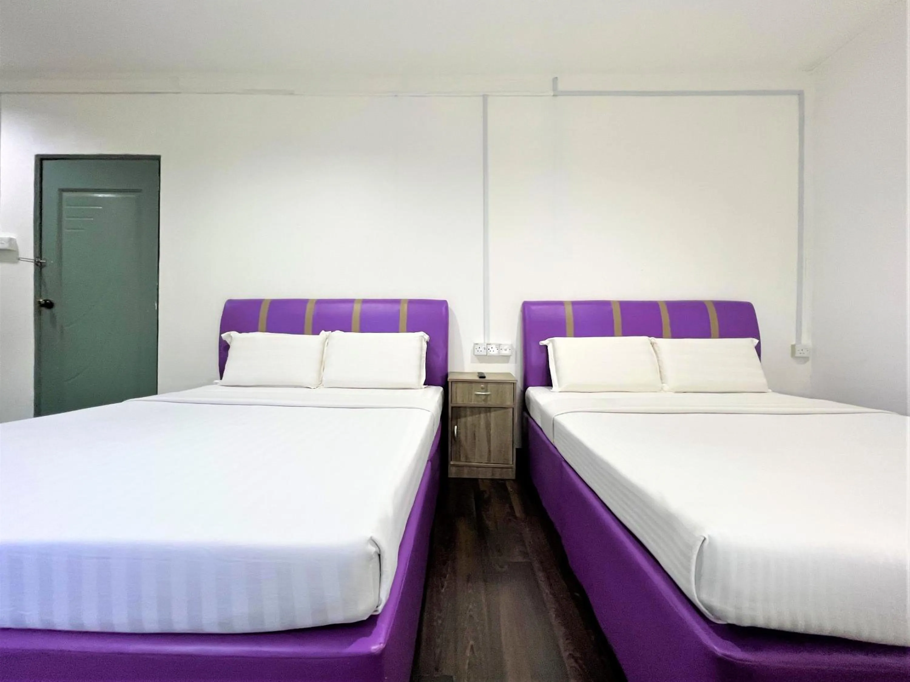 Bed in Suang Noh Homestay Kundasang