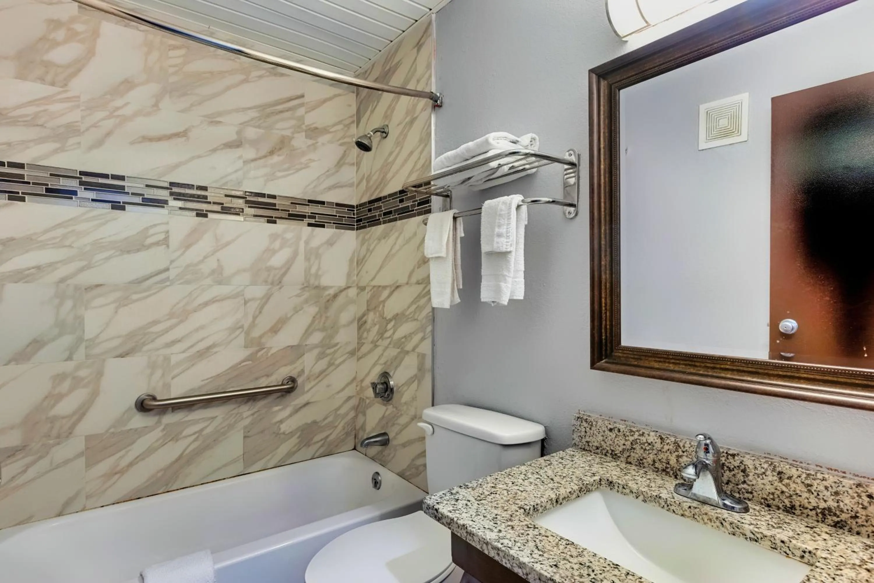 Bathroom in Days Inn by Wyndham Savannah Gateway I-95