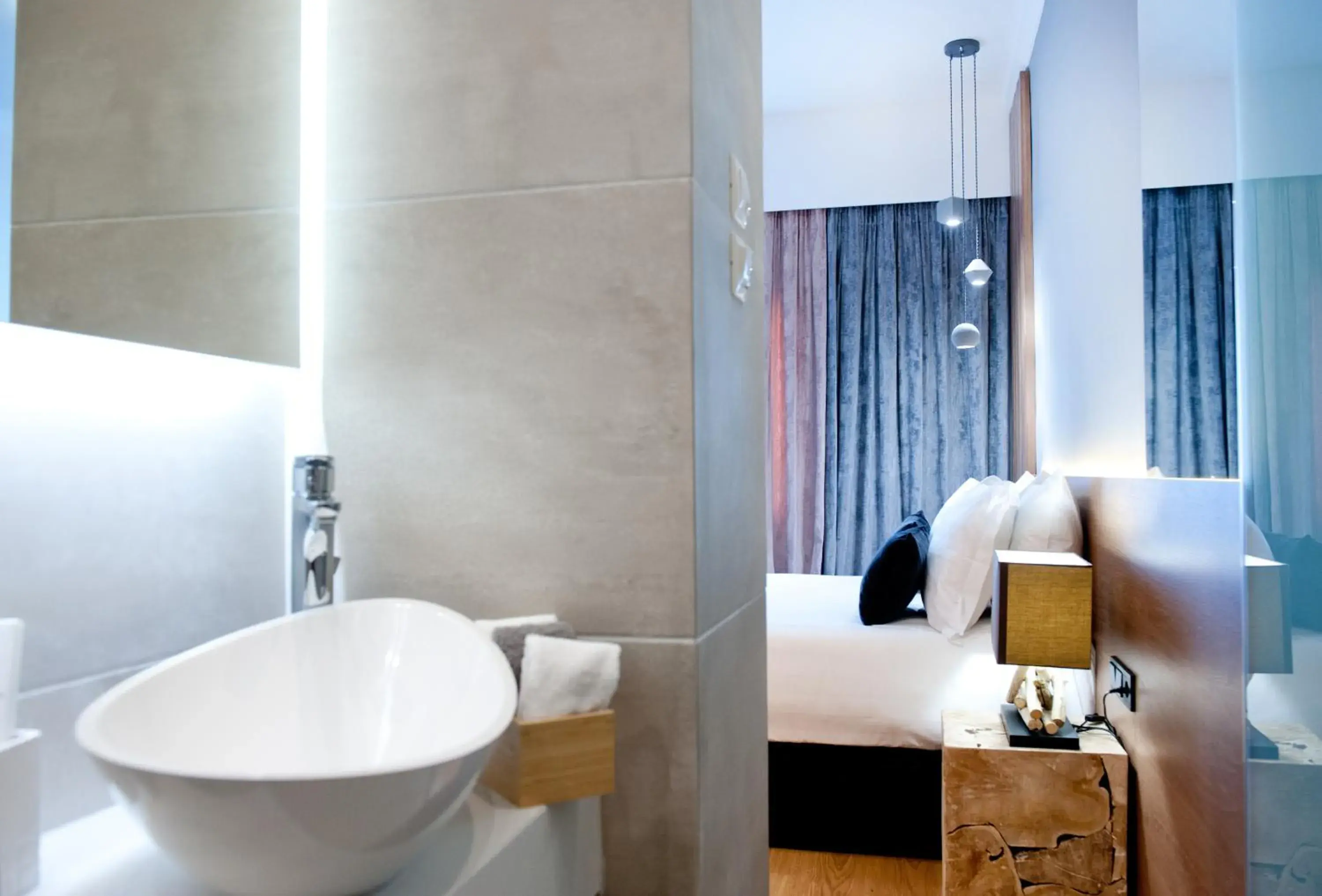 Bed in Acropolis View Deluxe Penthouse & Luxury Apartments Bed in Acropolis View Deluxe Penthouse & Luxury Apartments