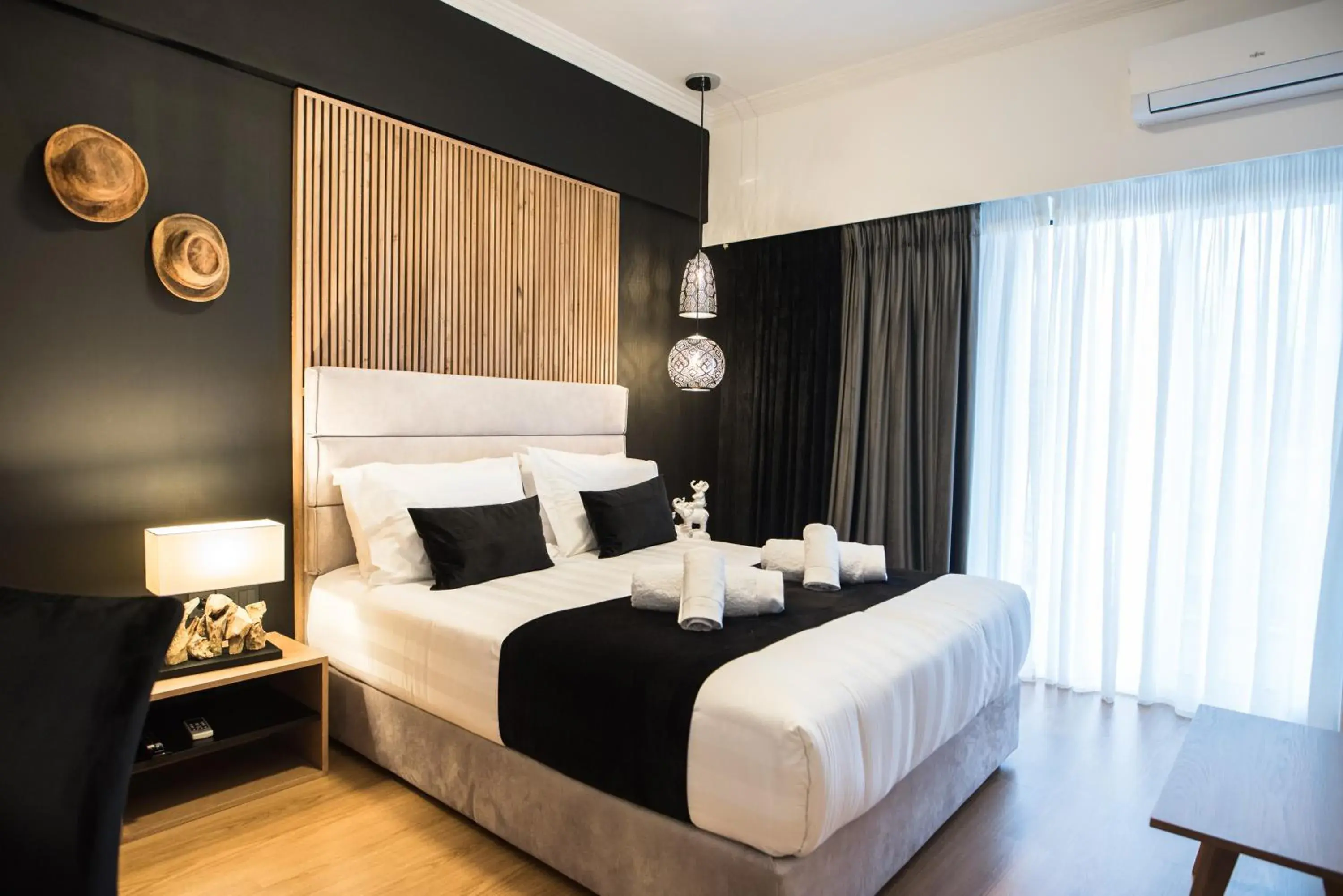 Bed in Acropolis View Deluxe Penthouse & Luxury Apartments Bed in Acropolis View Deluxe Penthouse & Luxury Apartments