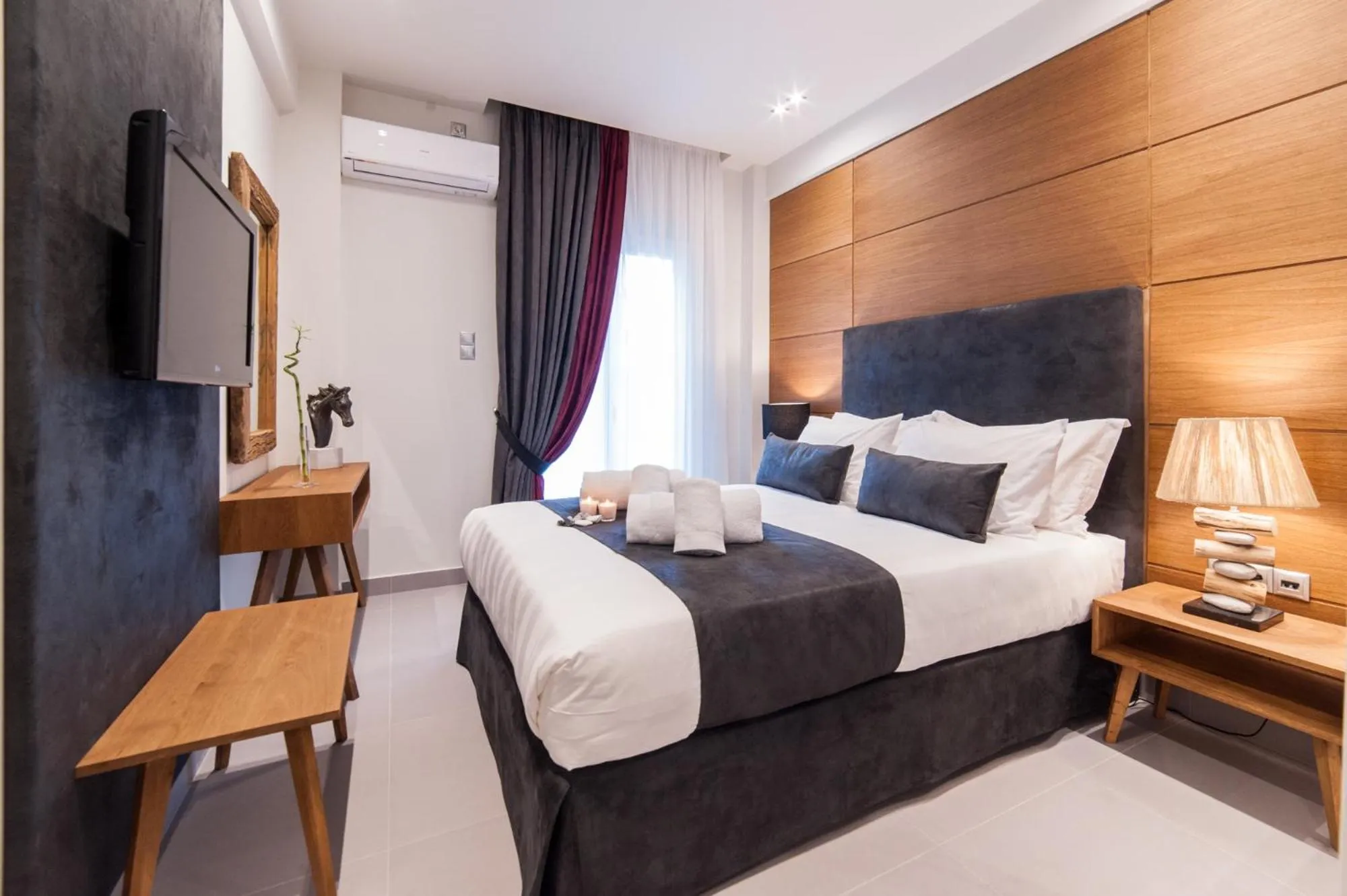 Bed in Acropolis View Deluxe Penthouse & Luxury Apartments