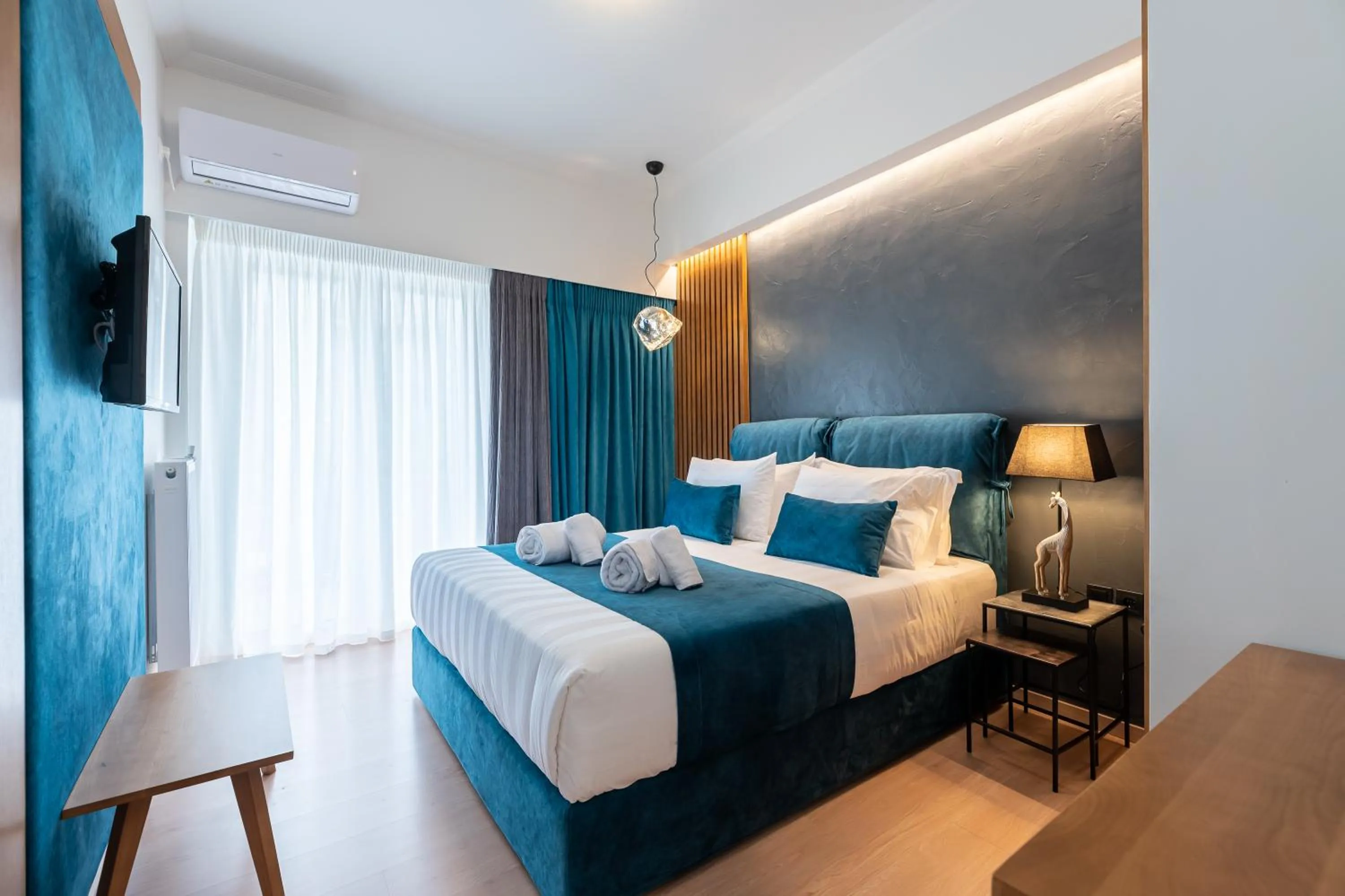 Bed in Acropolis View Deluxe Penthouse & Luxury Apartments