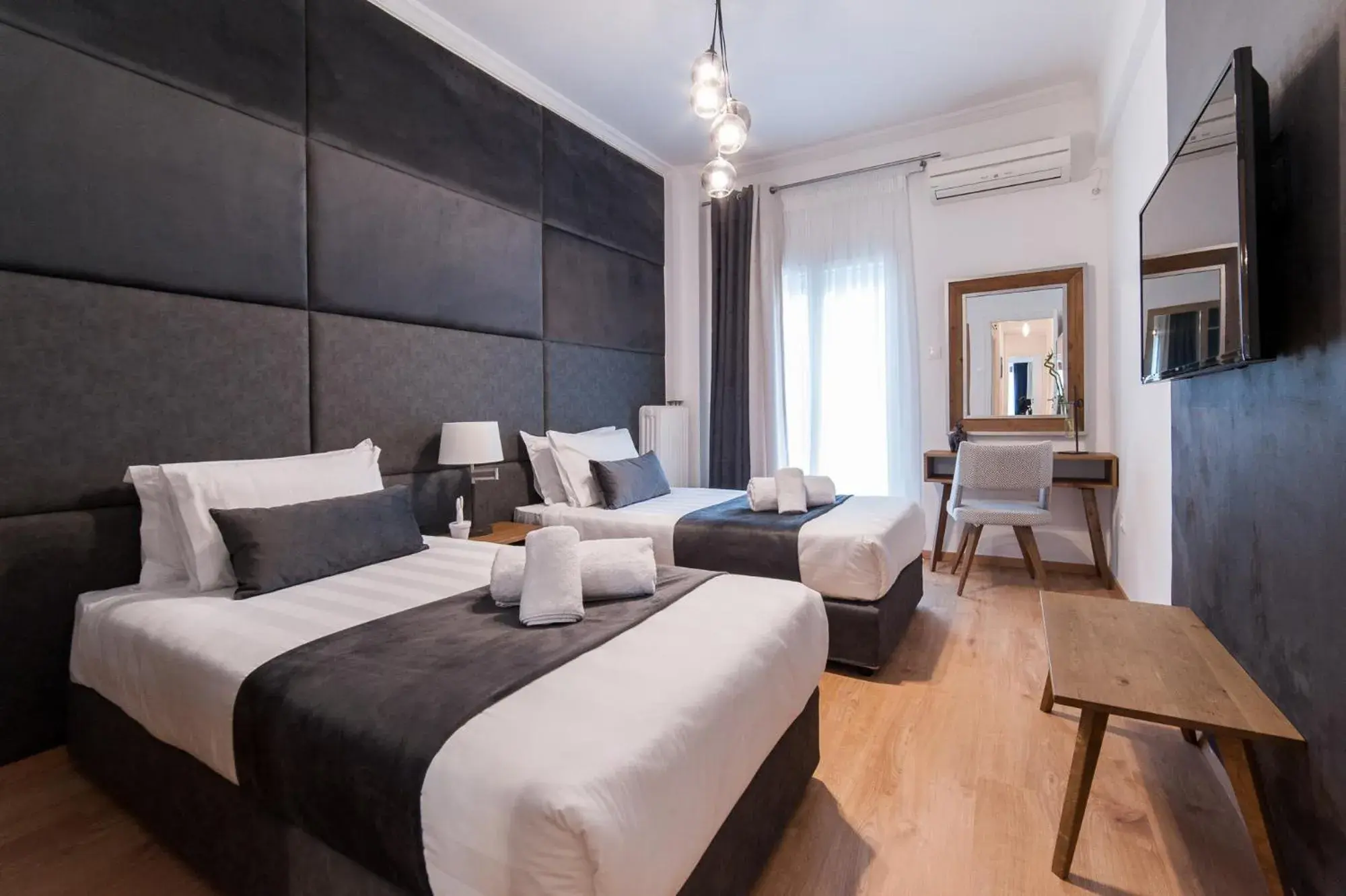 Bed in Acropolis View Deluxe Penthouse & Luxury Apartments Bed in Acropolis View Deluxe Penthouse & Luxury Apartments