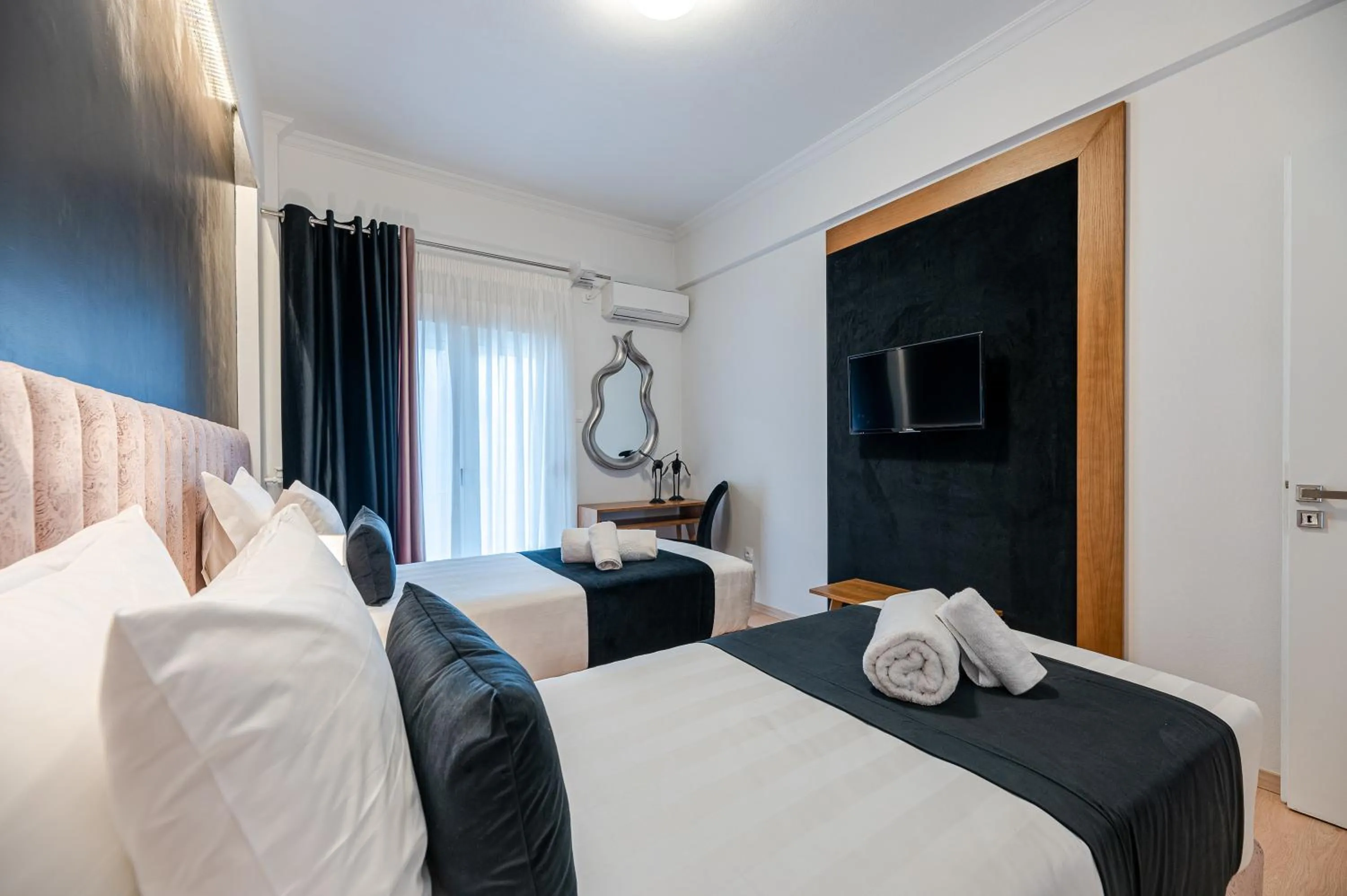 Bed in Acropolis View Deluxe Penthouse & Luxury Apartments