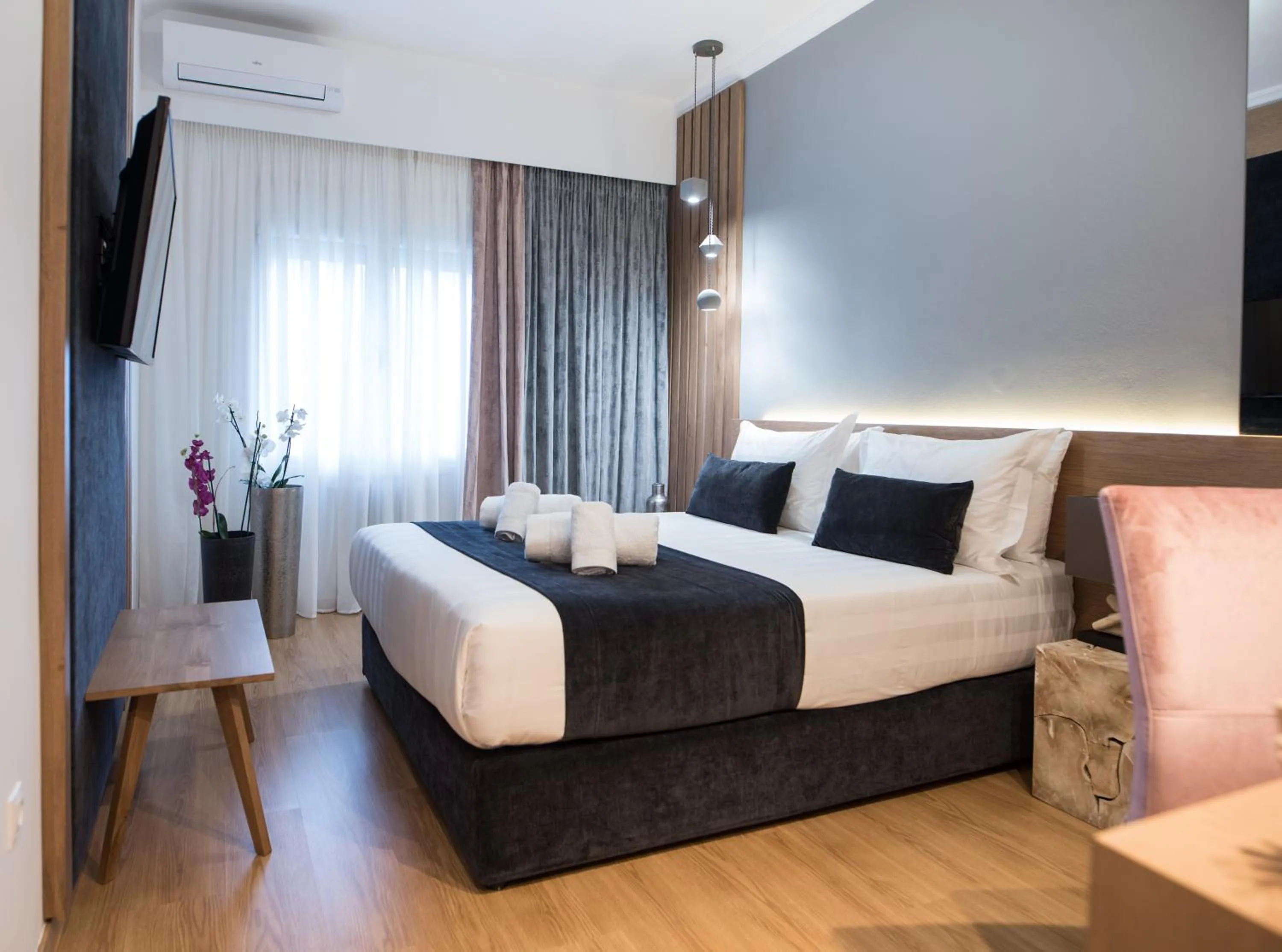 Bed in Acropolis View Deluxe Penthouse & Luxury Apartments