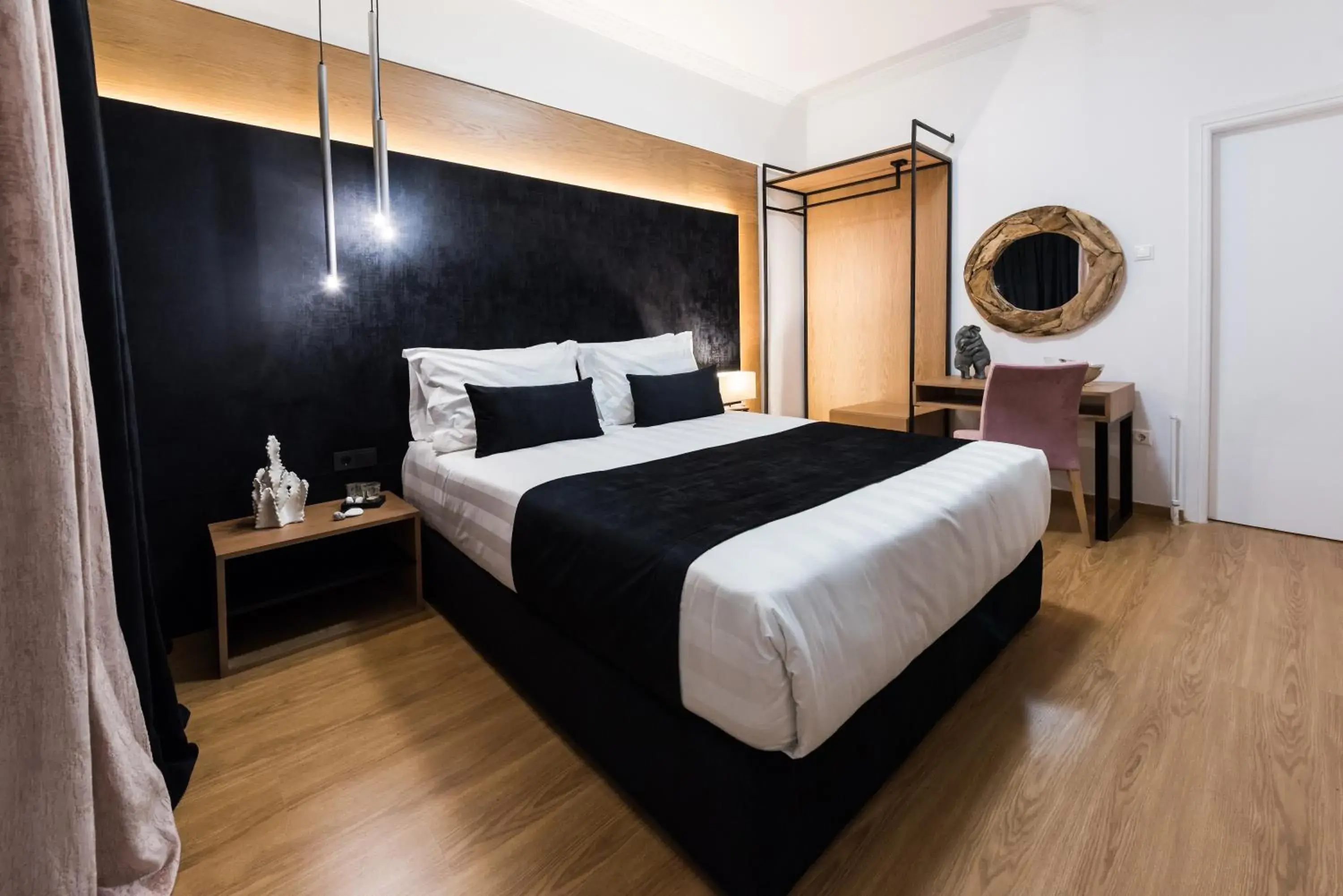 Bed in Acropolis View Deluxe Penthouse & Luxury Apartments Bed in Acropolis View Deluxe Penthouse & Luxury Apartments