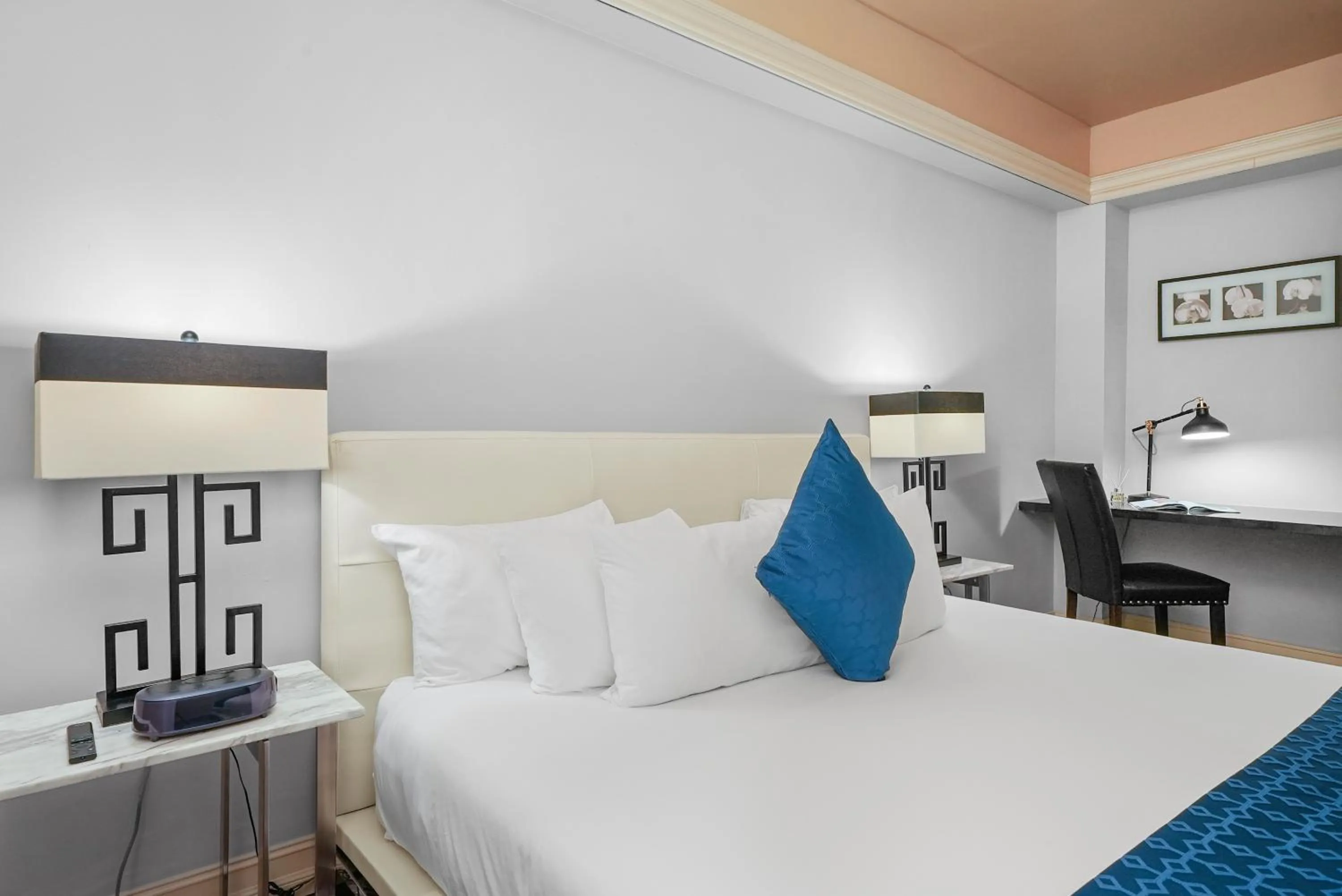 Bed in Riviera Suites