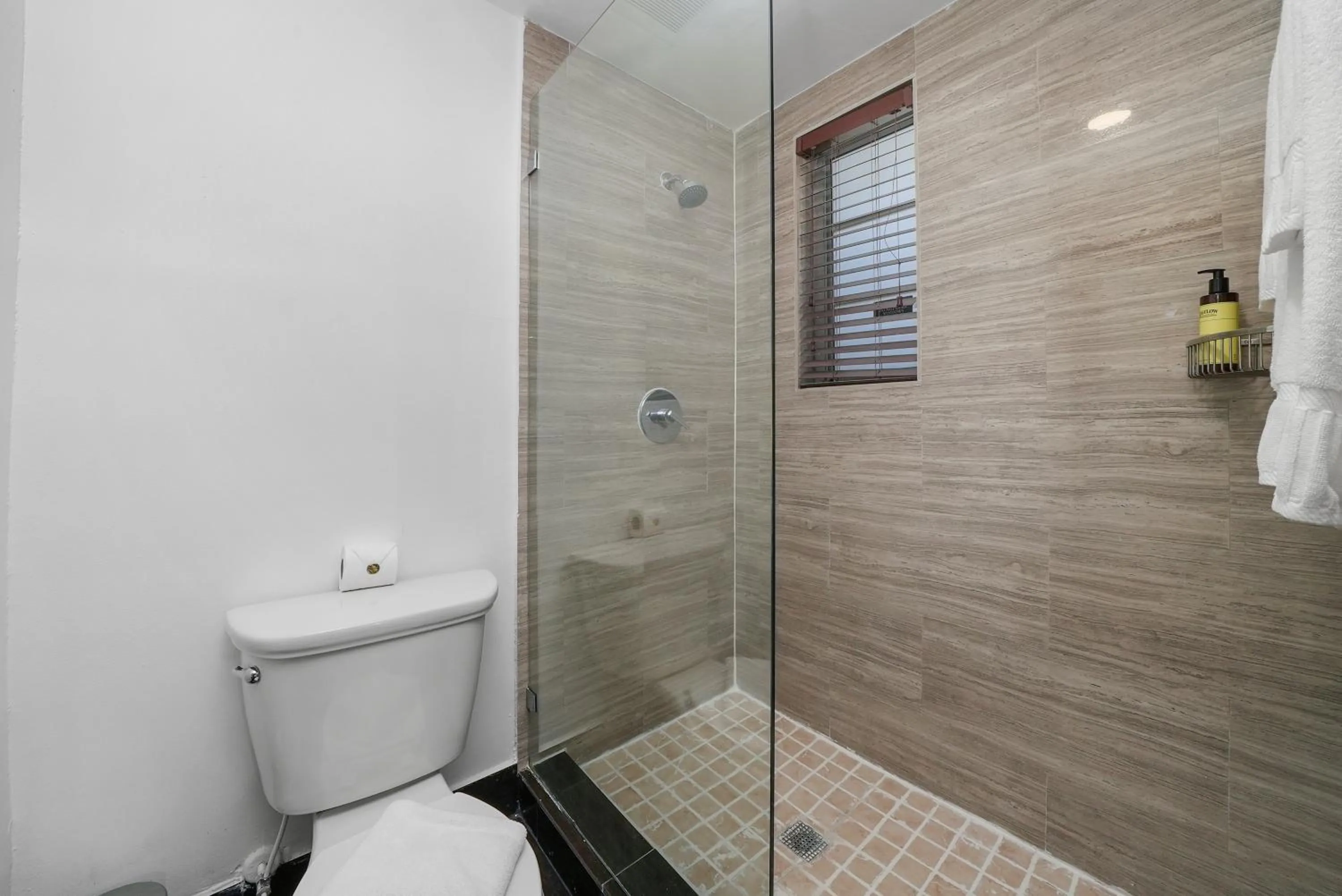 Toilet in Riviera Suites