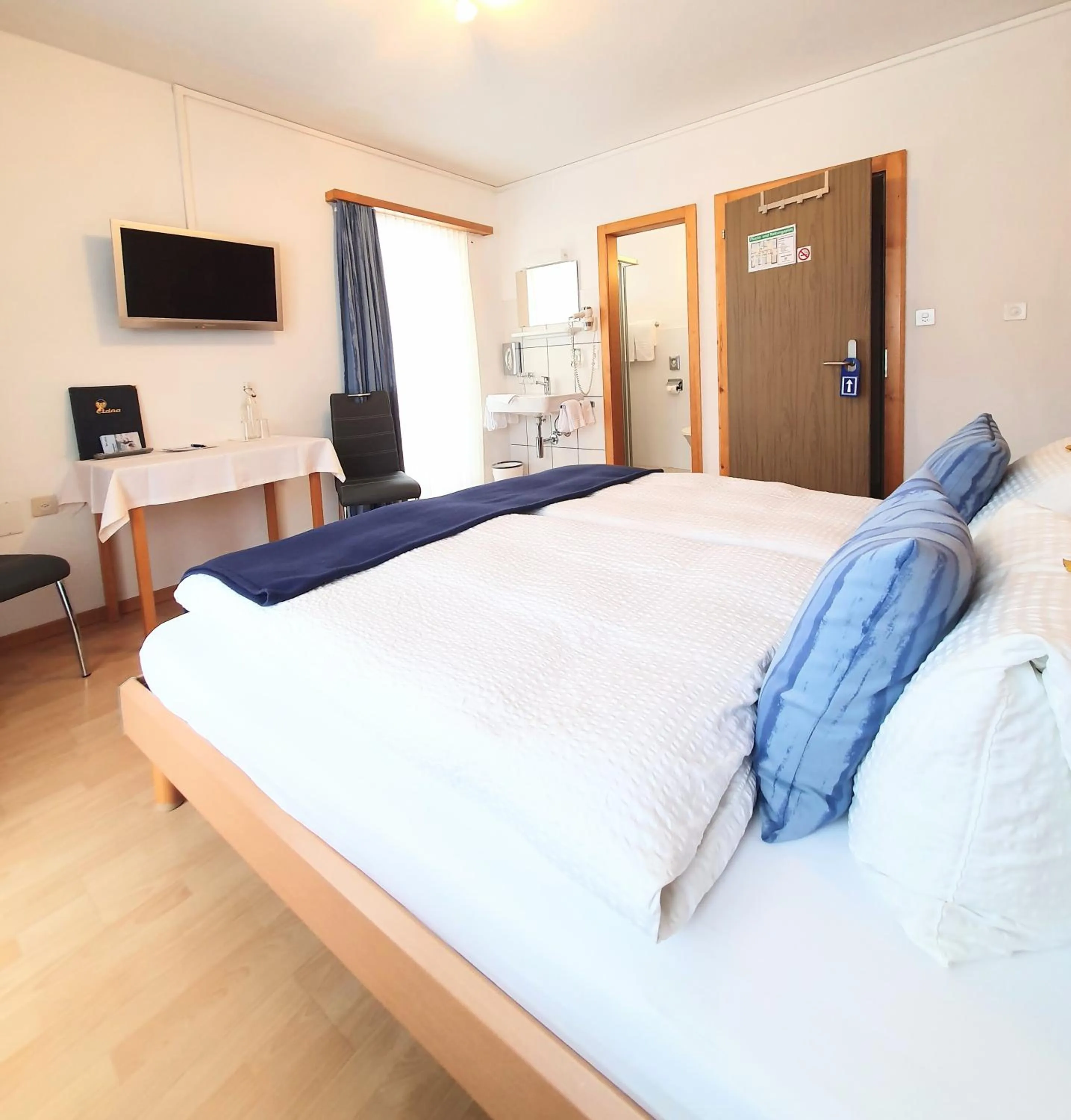 Photo of the whole room, Bed in Hotel-Restaurant Grina