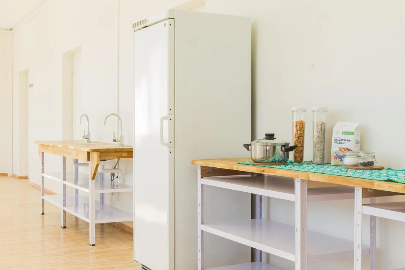 Communal kitchen in EHE Hostel