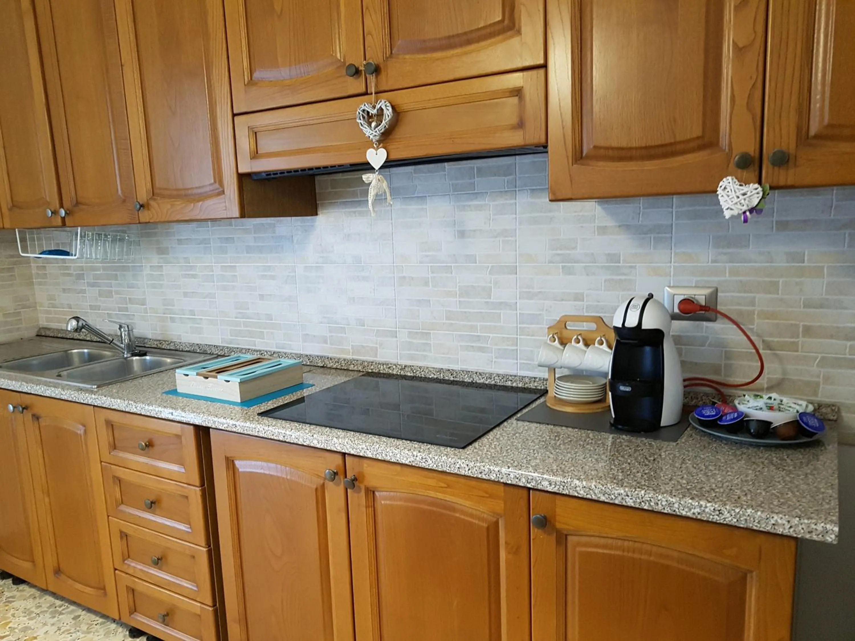 Communal kitchen in B&B Buscemi