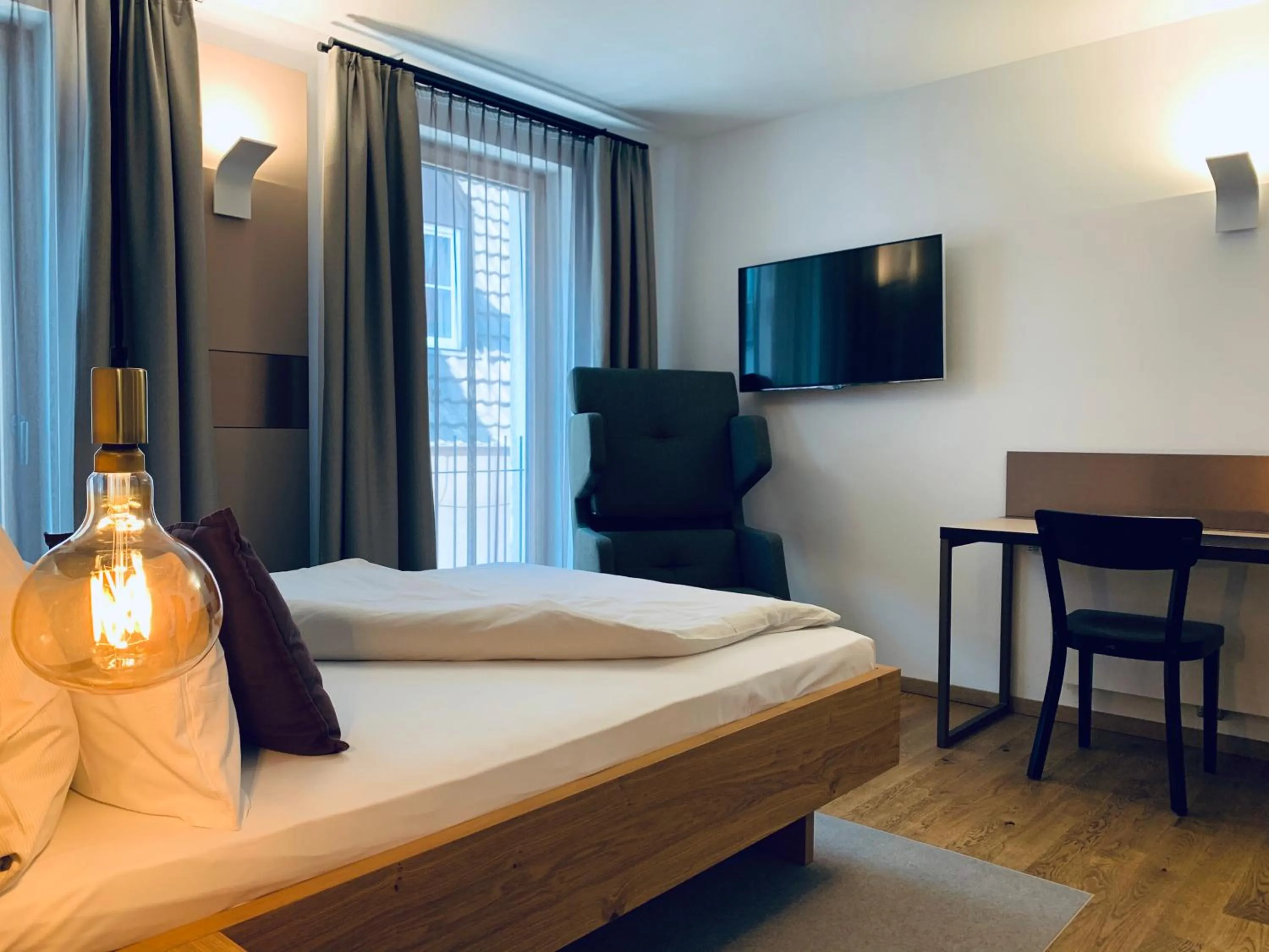 Bedroom, Bed in Stadthotel Kachelofen