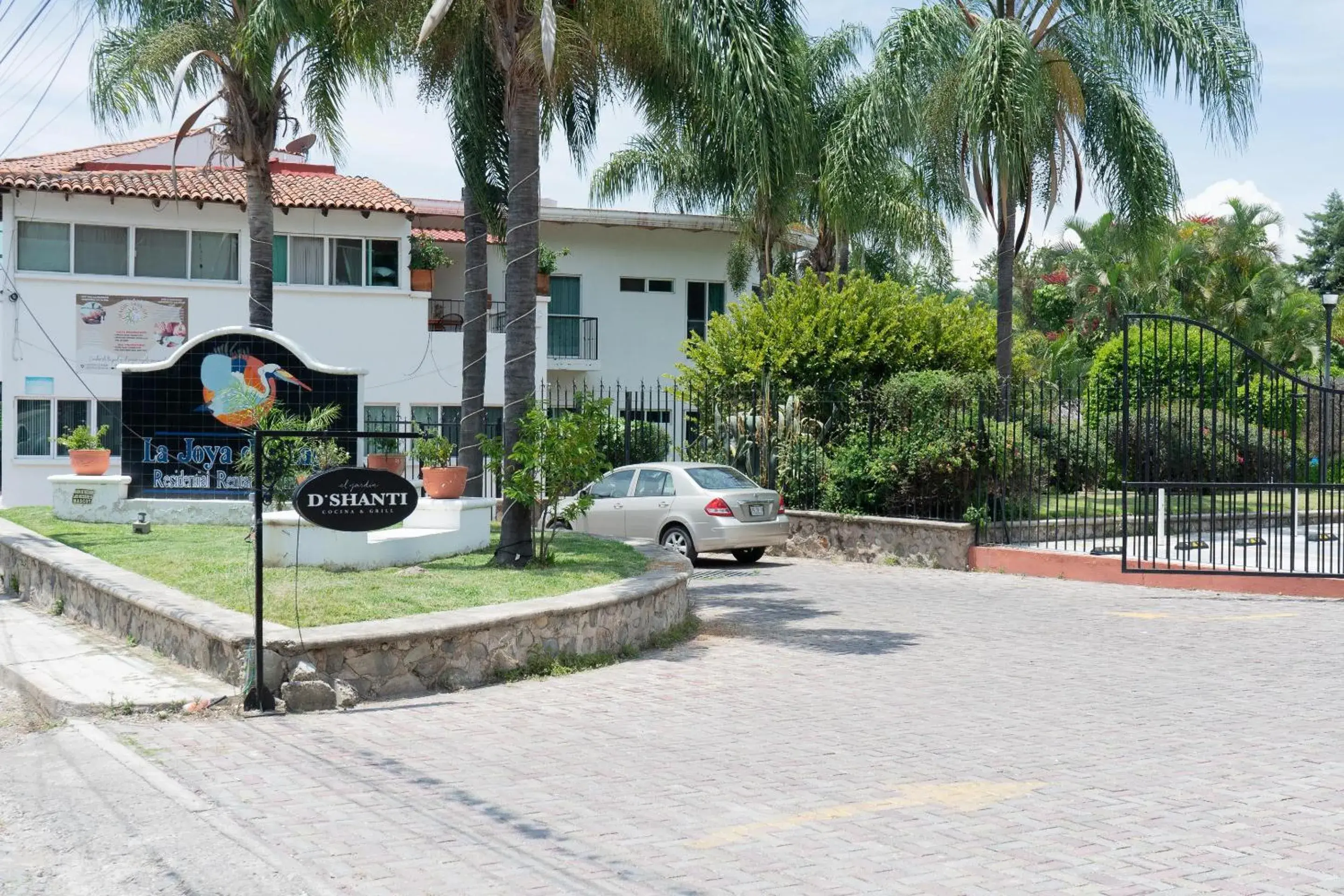 Facade/entrance in Capital O La Joya Del Lago Facade/entrance in Capital O La Joya Del Lago