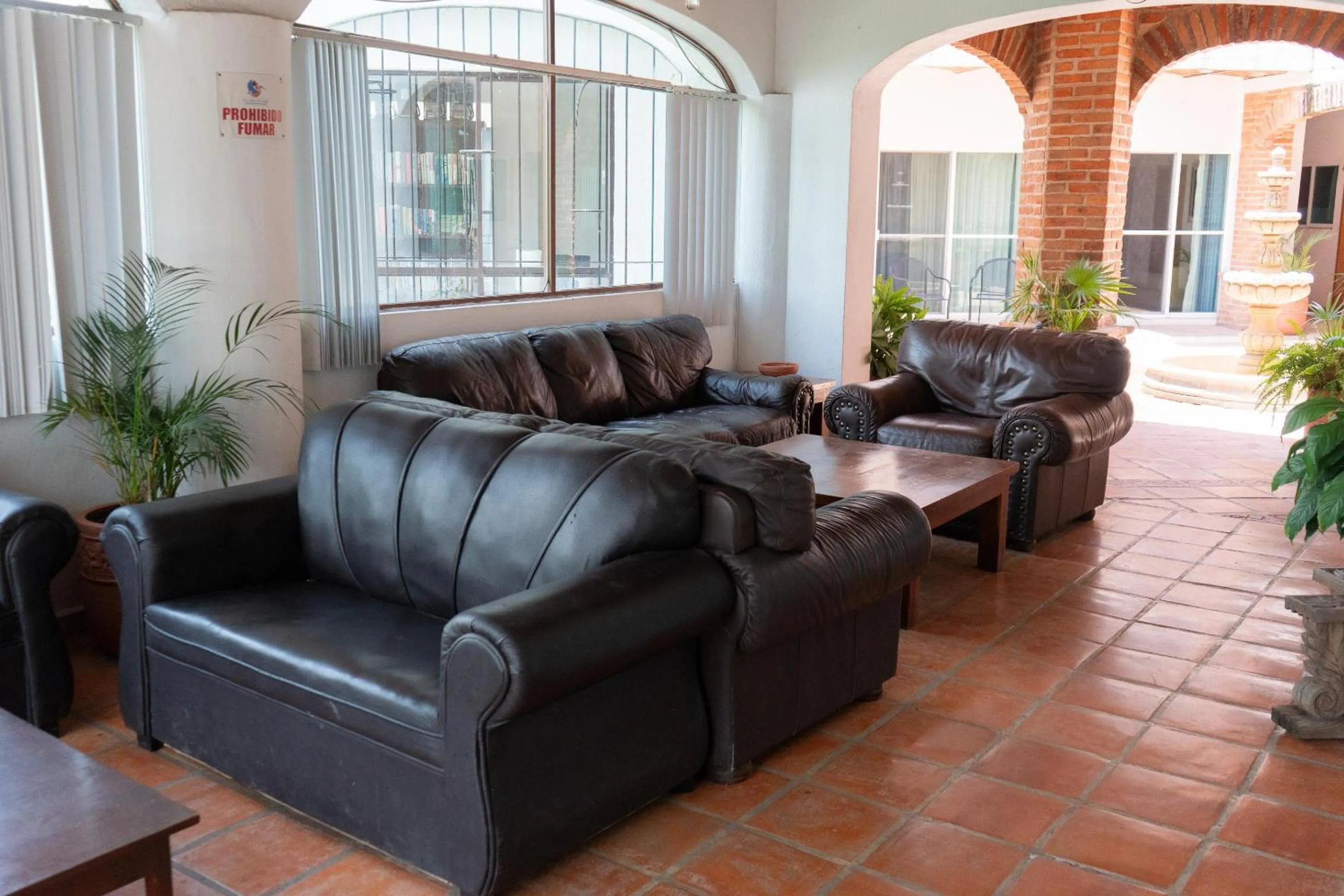 Lobby or reception in Capital O La Joya Del Lago