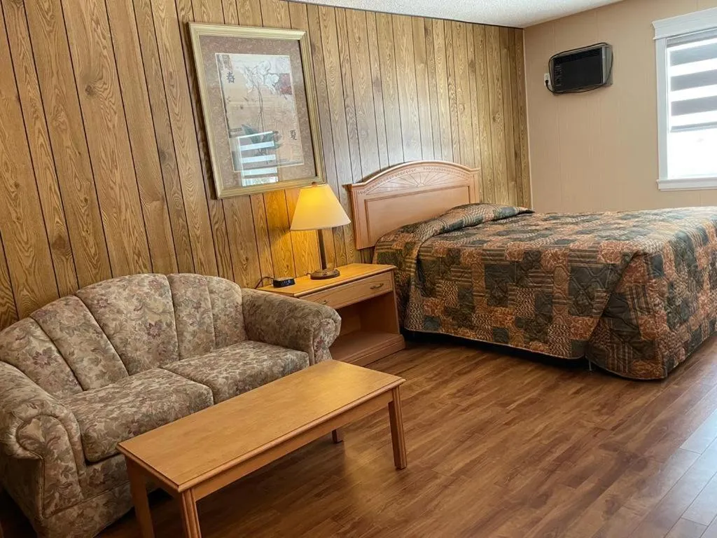 Bed in Green View Motel and RV Park