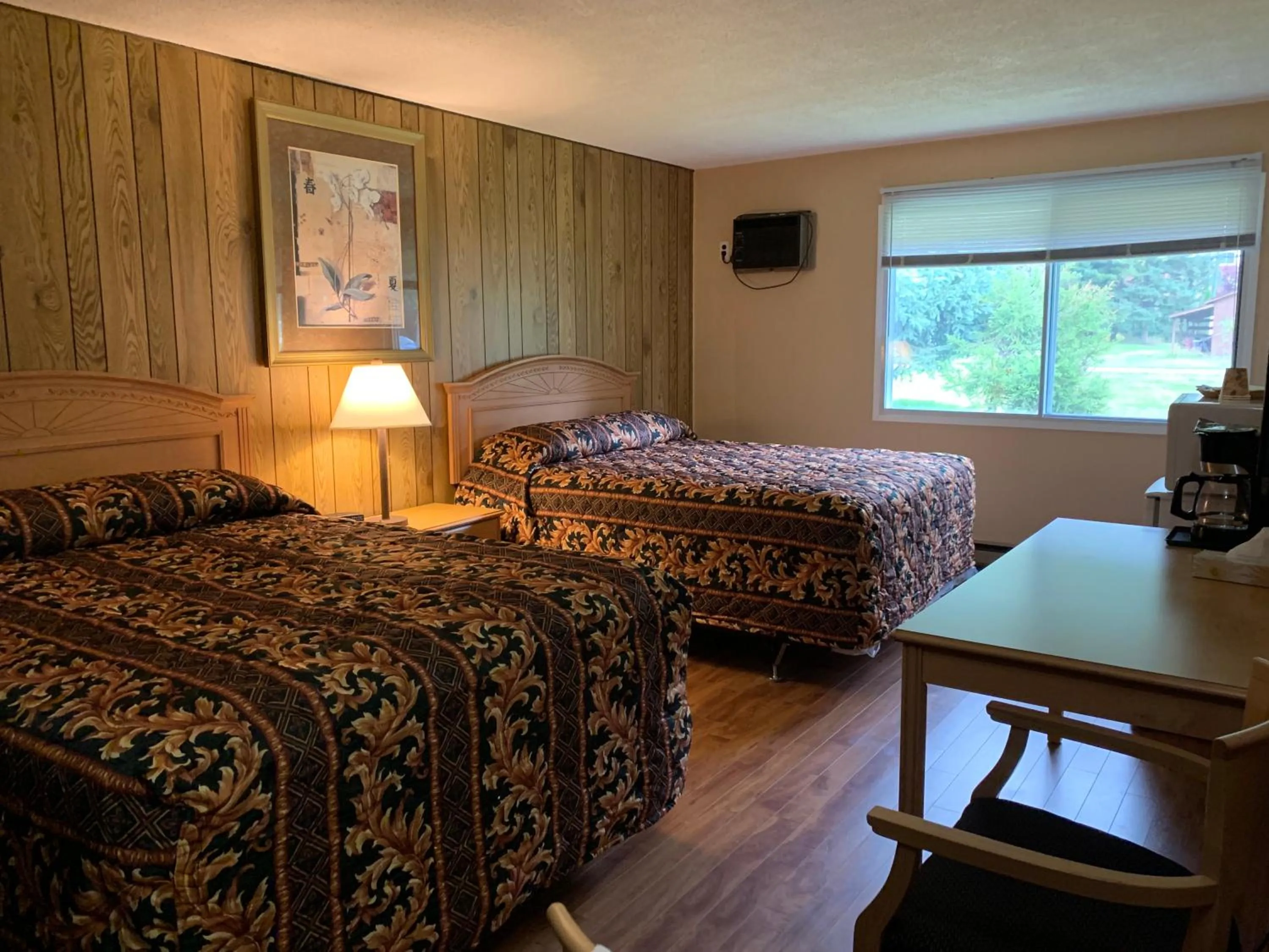 Bed in Green View Motel and RV Park