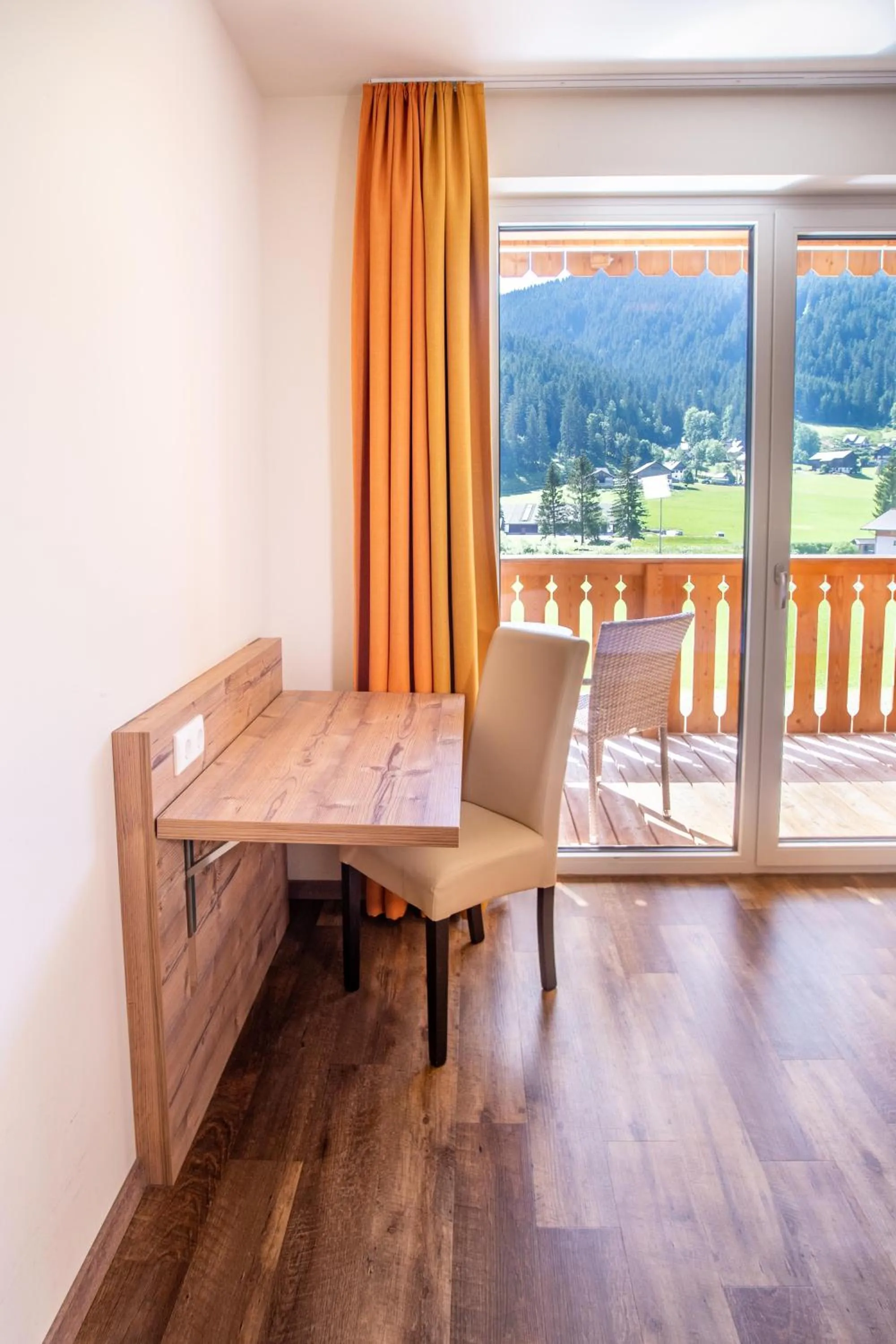 Photo of the whole room in COOEE alpin Hotel Dachstein