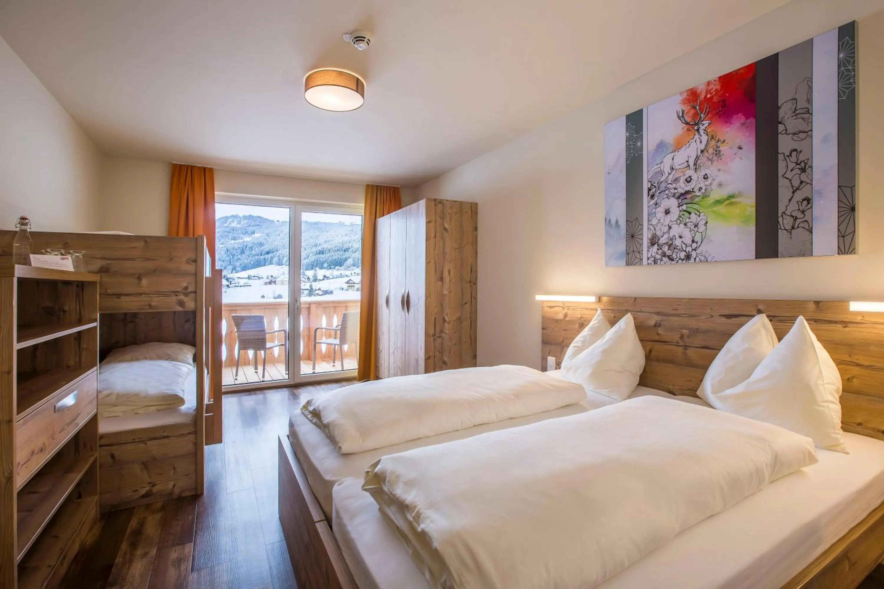 Photo of the whole room, Bed in COOEE alpin Hotel Dachstein