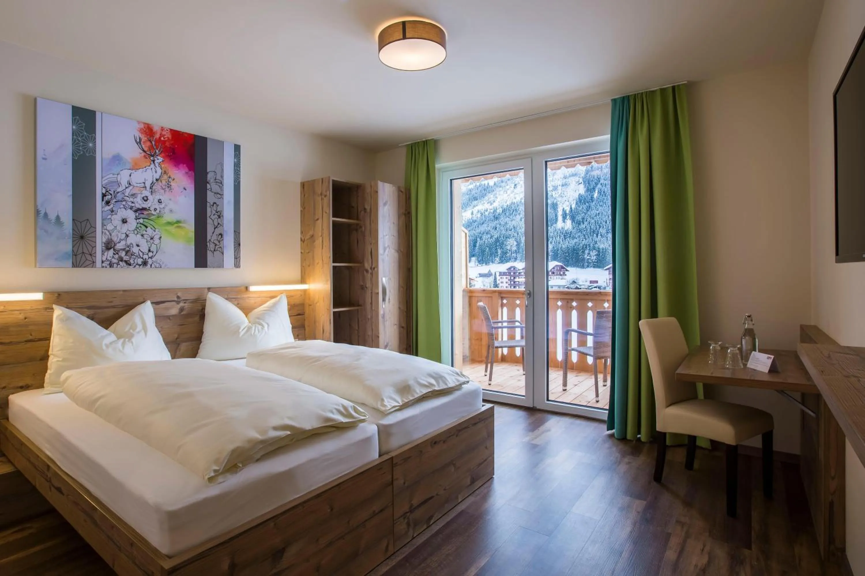 Photo of the whole room, Bed in COOEE alpin Hotel Dachstein