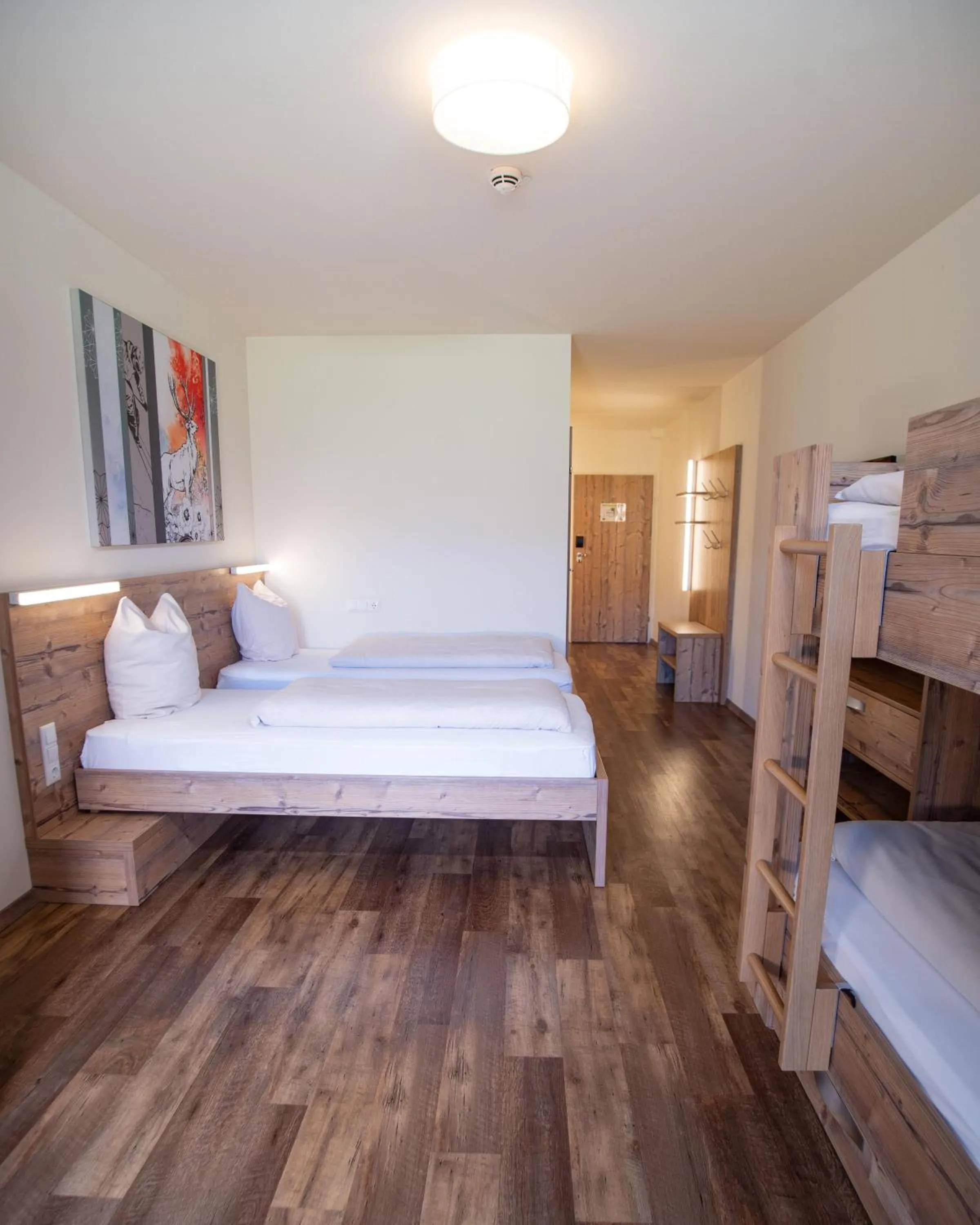 Photo of the whole room, Bed in COOEE alpin Hotel Dachstein