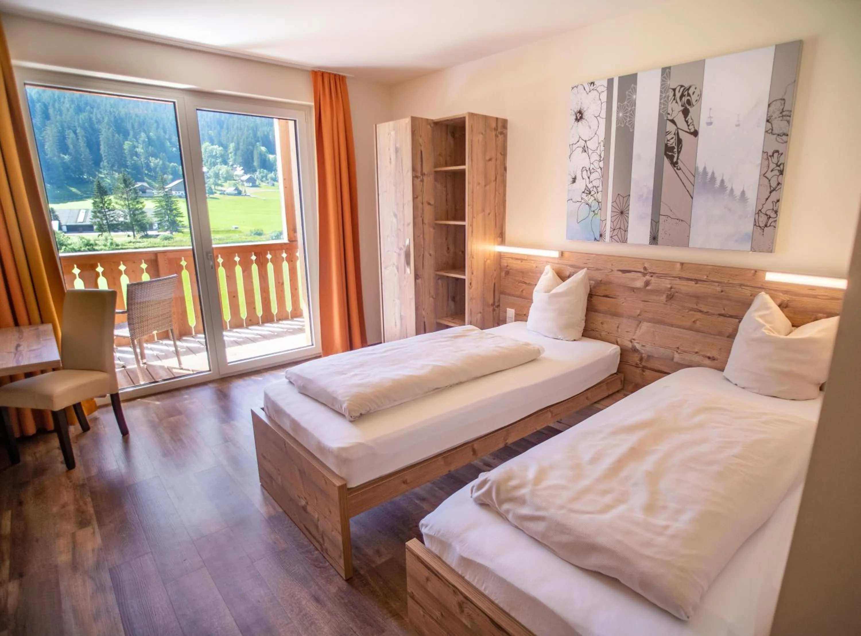 Photo of the whole room, Bed in COOEE alpin Hotel Dachstein