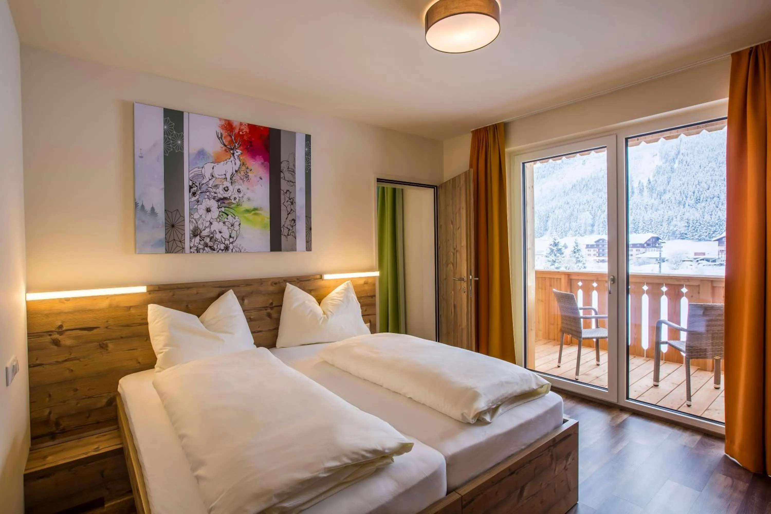 Photo of the whole room, Bed in COOEE alpin Hotel Dachstein