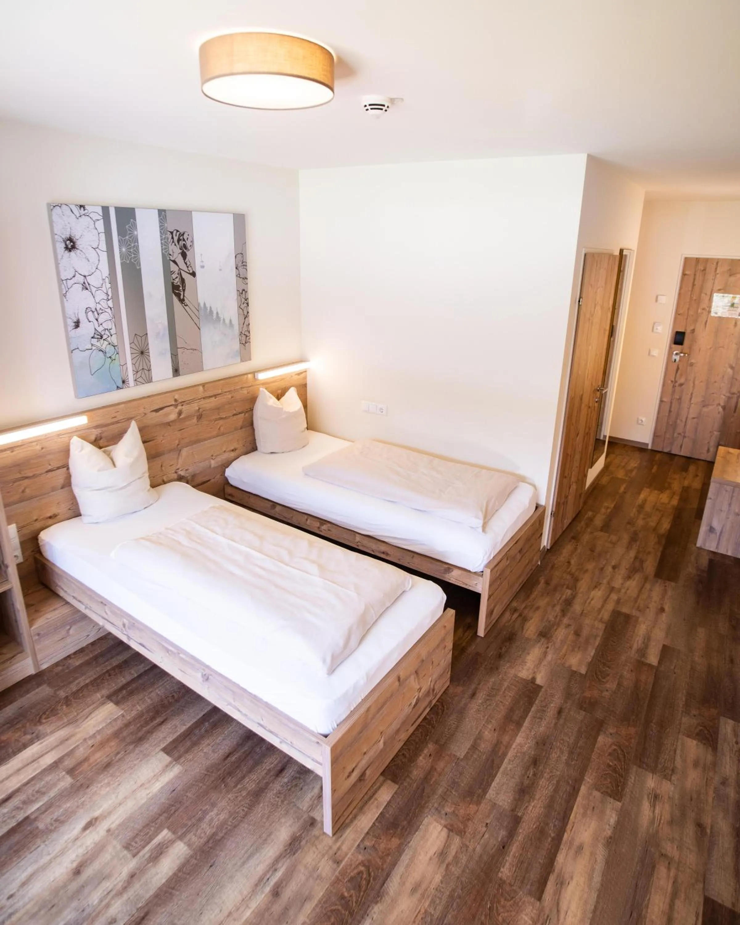 Photo of the whole room, Bed in COOEE alpin Hotel Dachstein