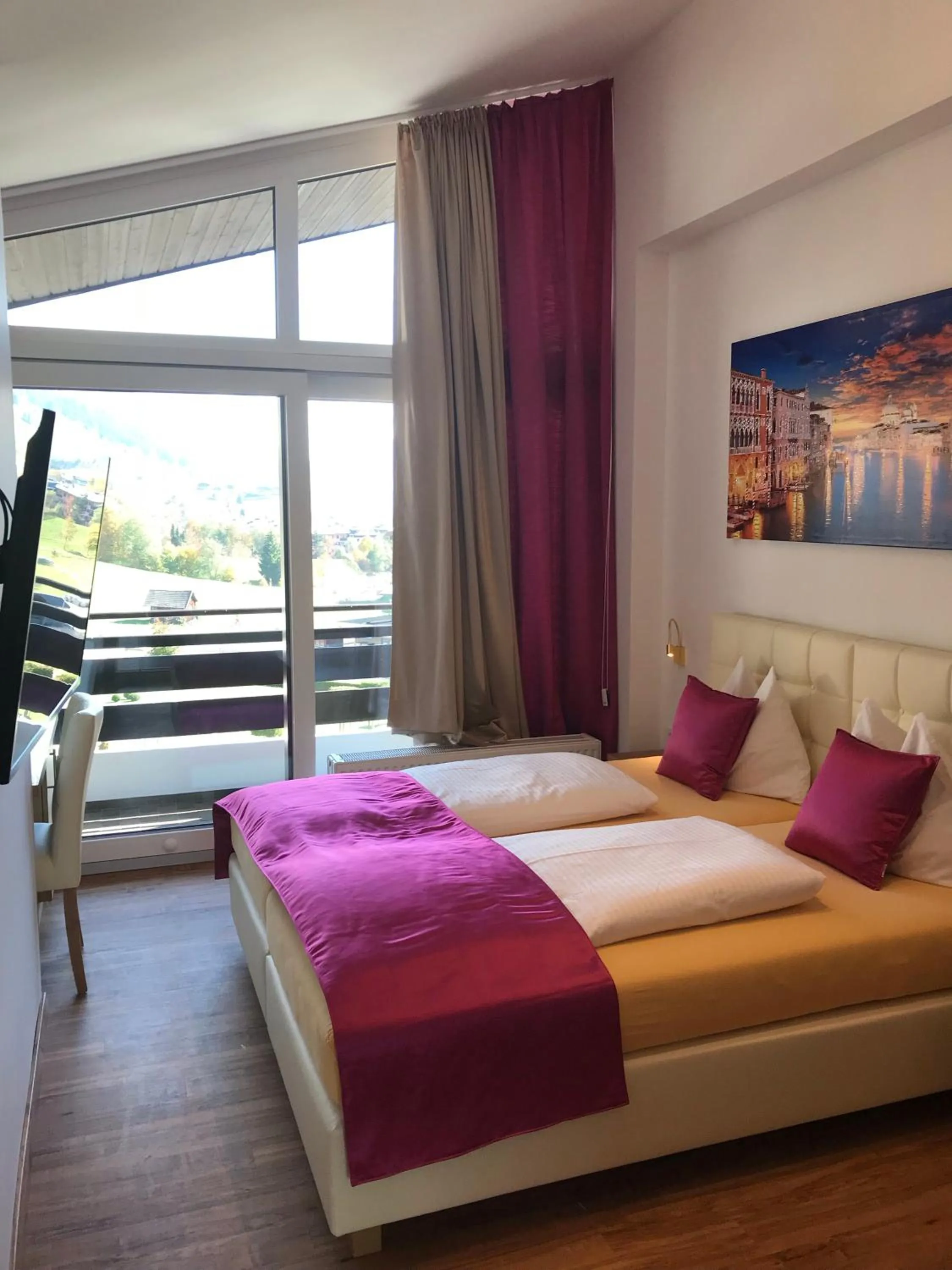 Photo of the whole room, Bed in Berger's Sporthotel