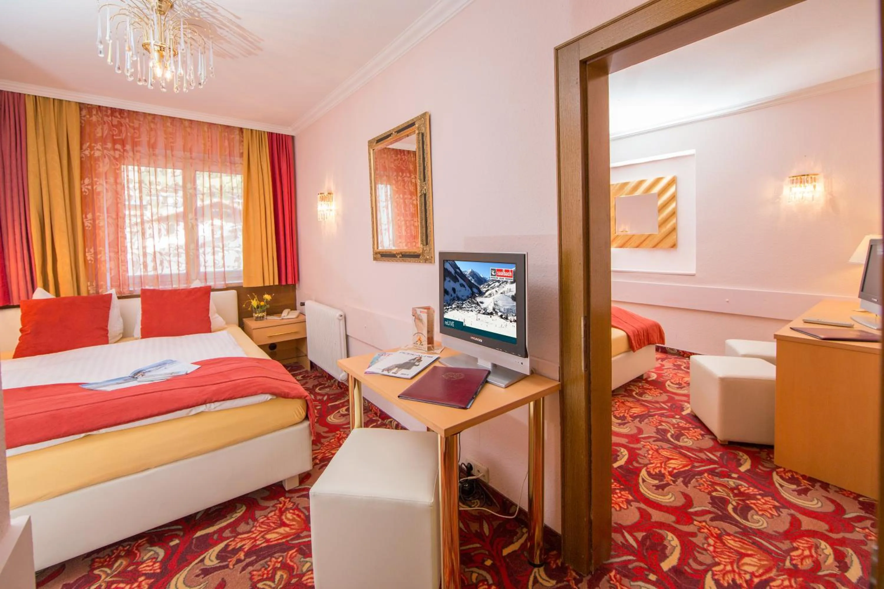 Photo of the whole room, Bed in Berger's Sporthotel