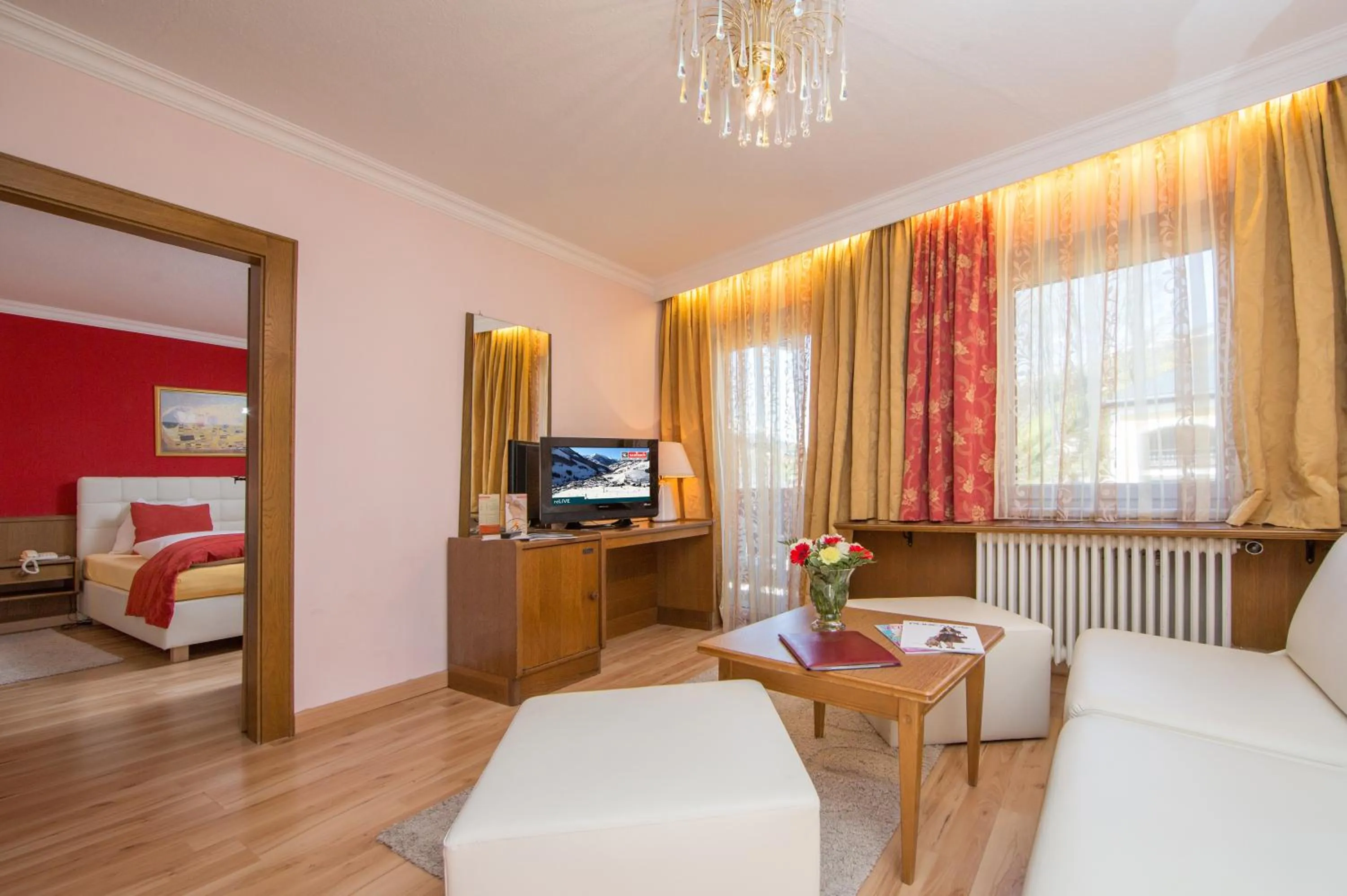 Photo of the whole room, Bed in Berger's Sporthotel