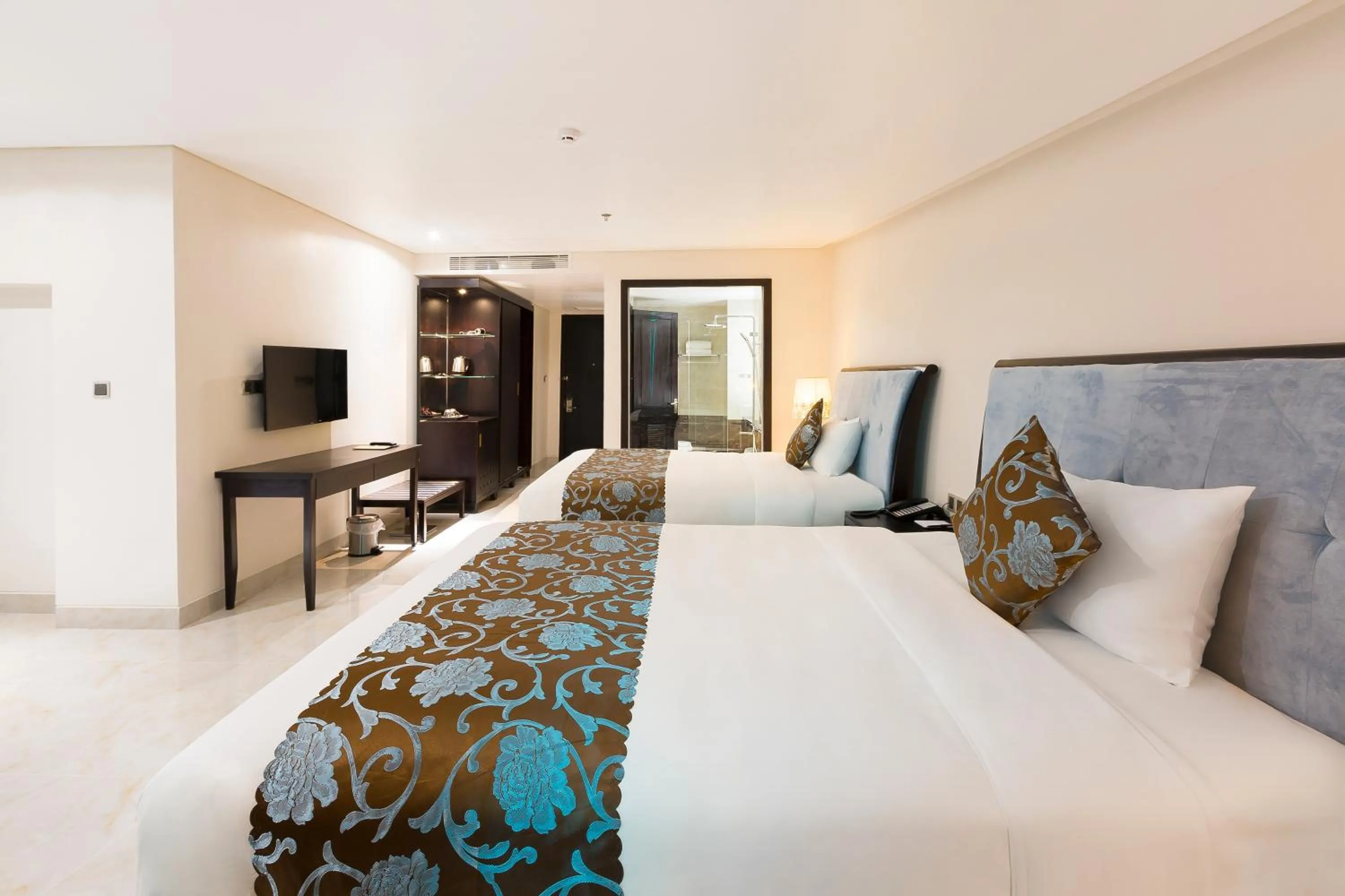 Bed in Royal Quang Binh Hotel