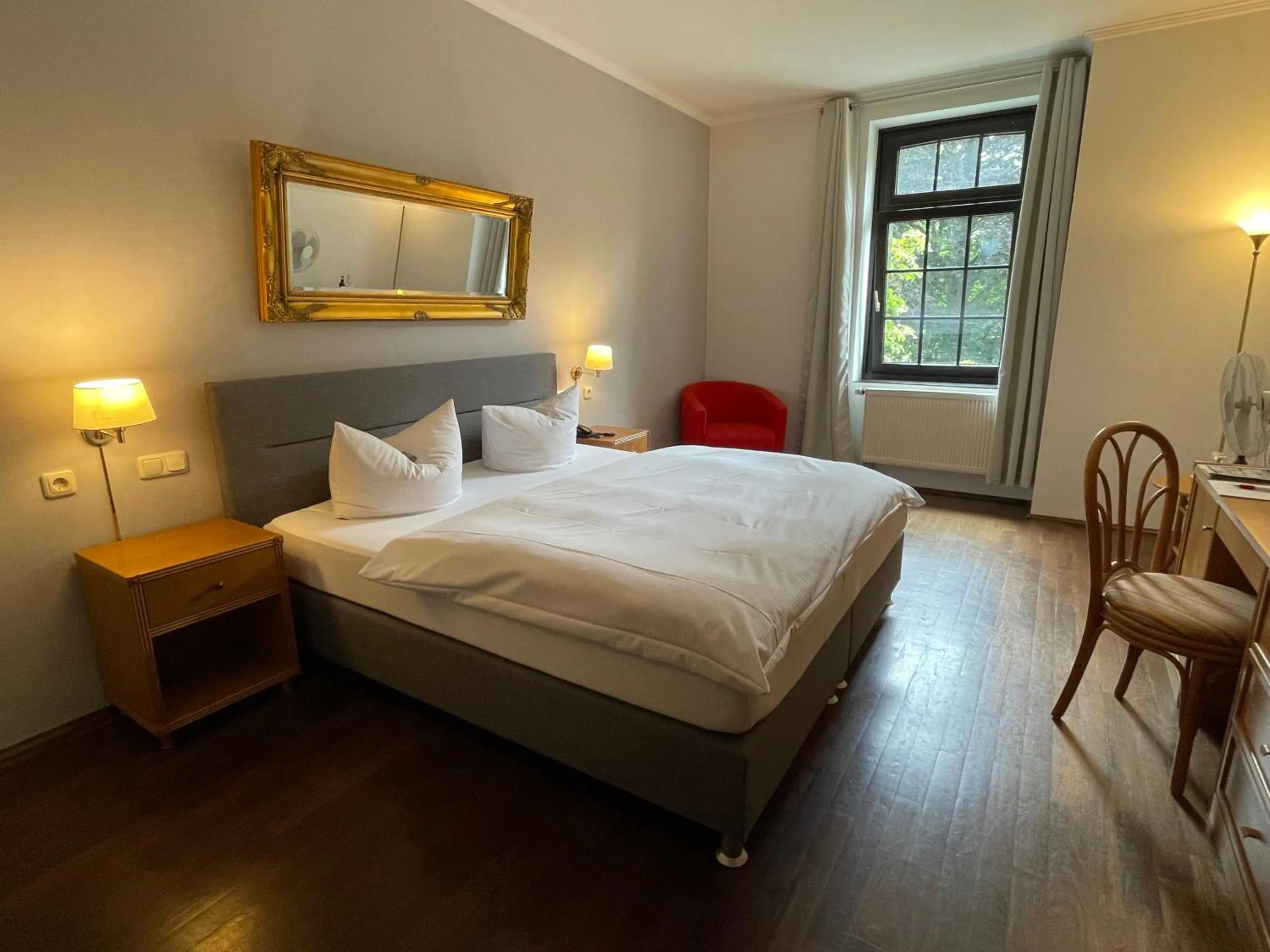 Photo of the whole room, Bed in Burg Wegberg Hotel & Eventlocation