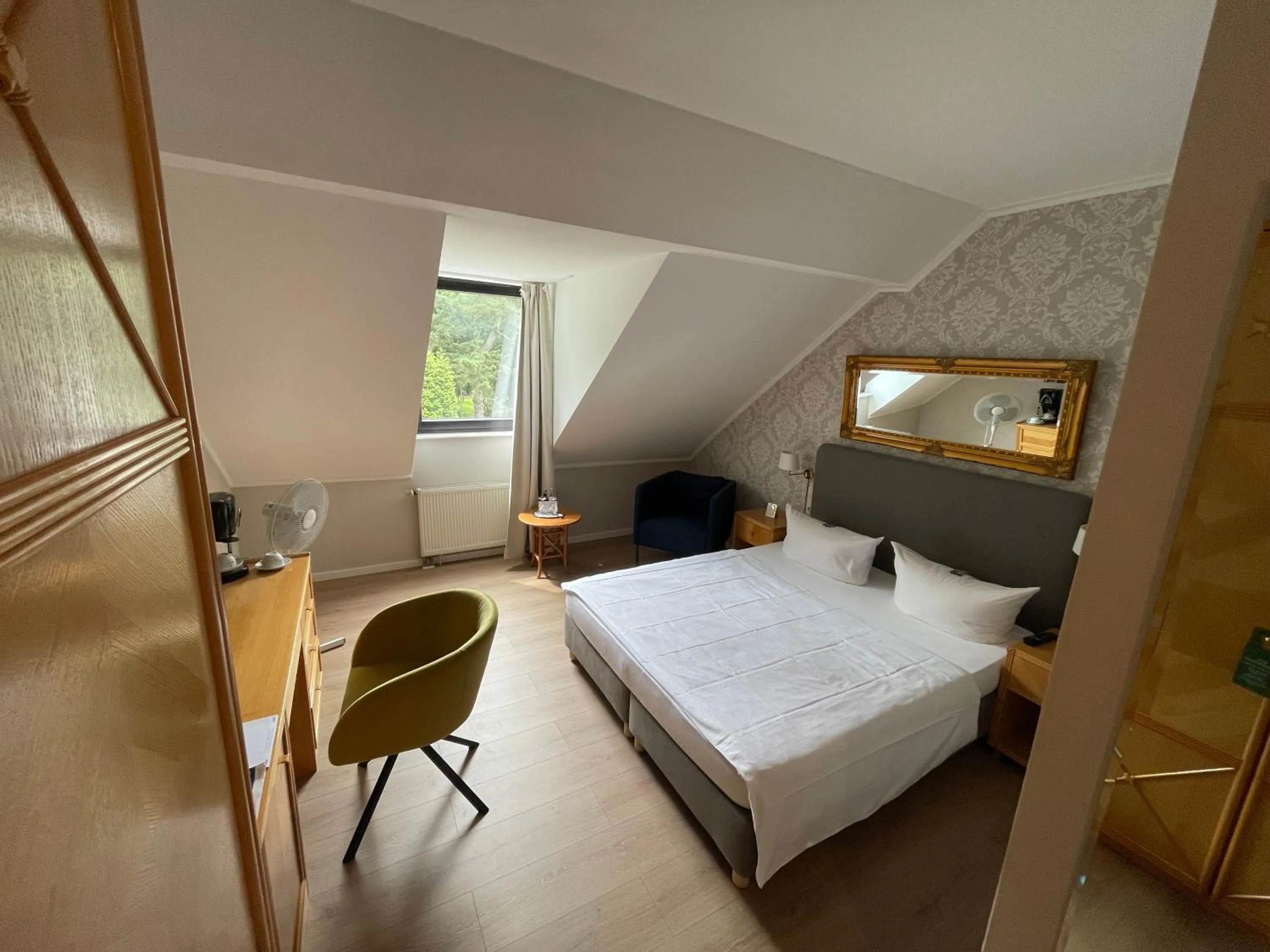 Photo of the whole room, Bed in Burg Wegberg Hotel & Eventlocation
