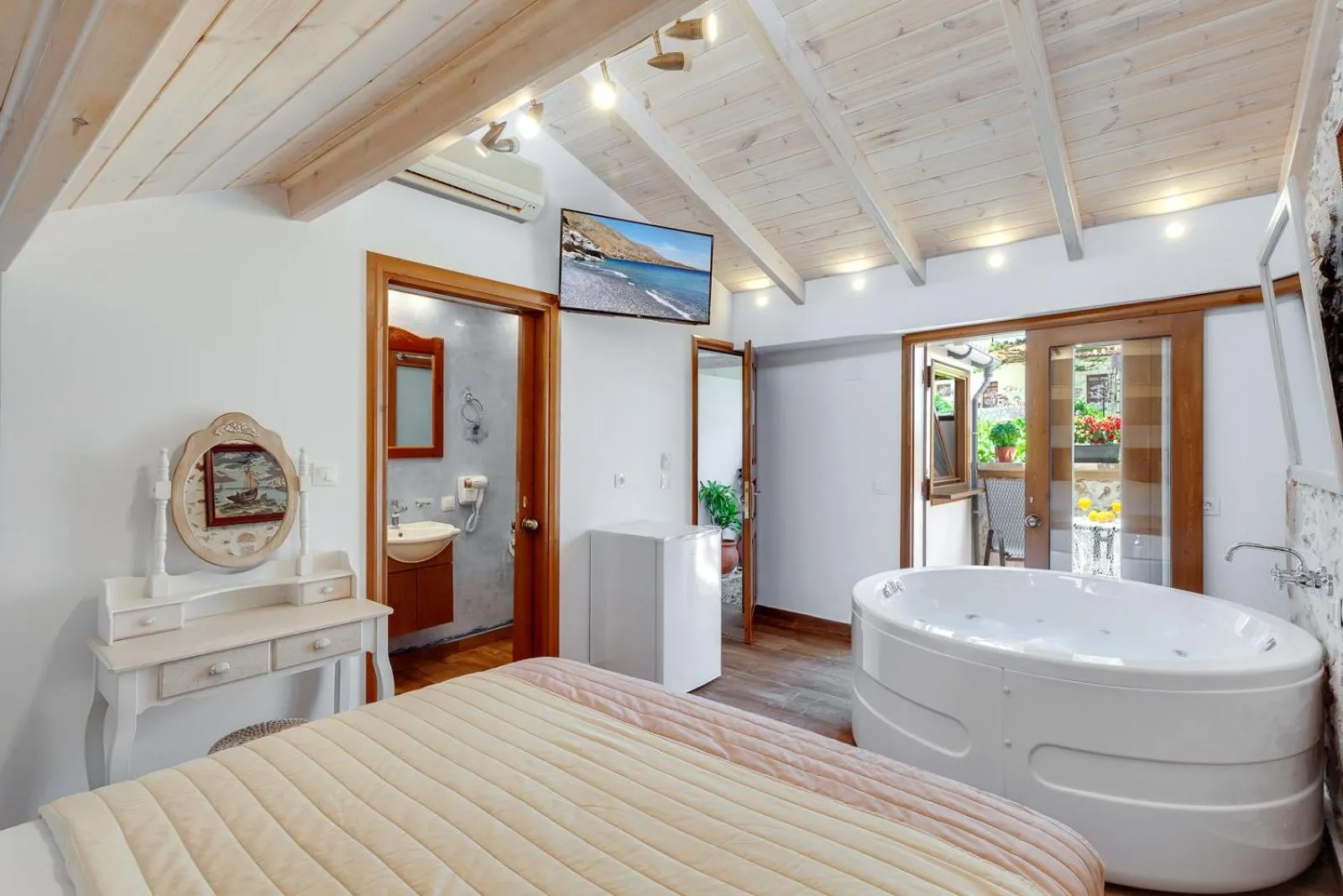 Bed in Hamam Suites Portou