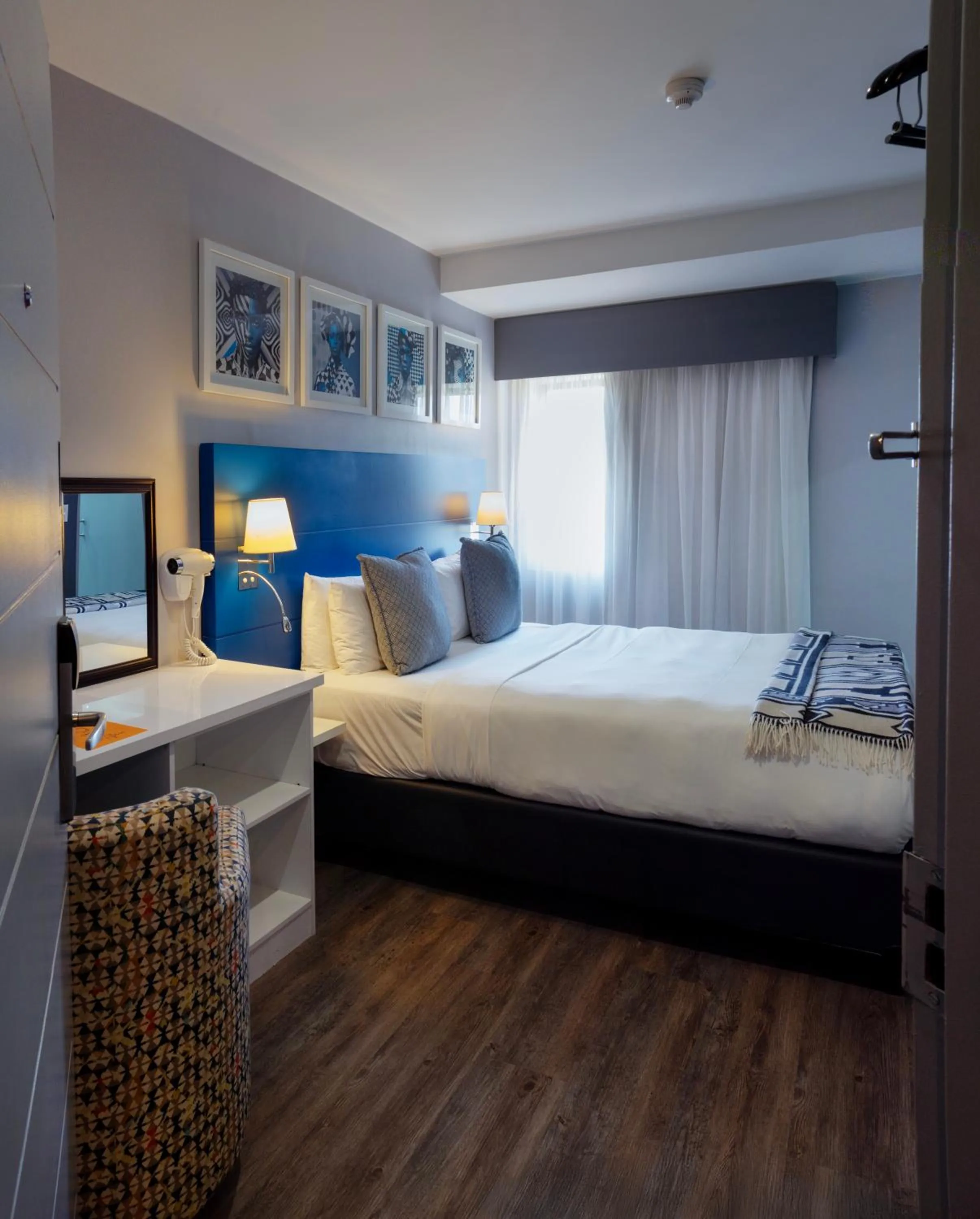 Bed in ONOMO Hotel Johannesburg Sandton