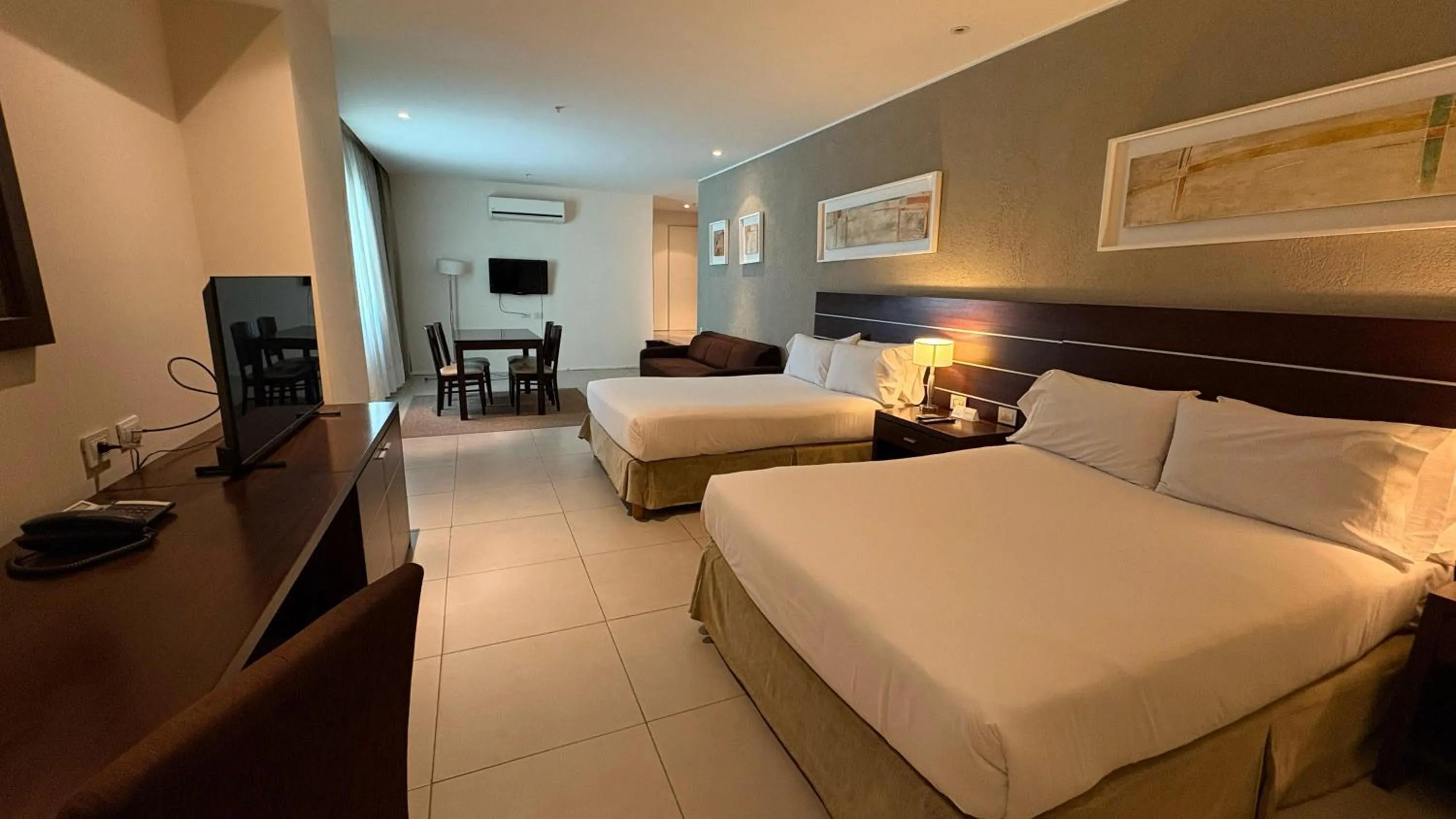 Bed in Orfeo Suites Cordoba