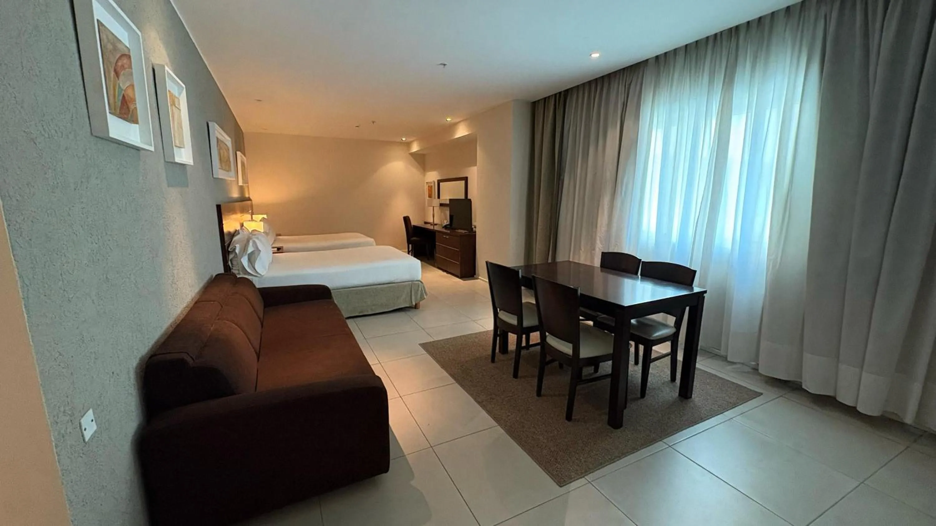 Bed in Orfeo Suites Cordoba