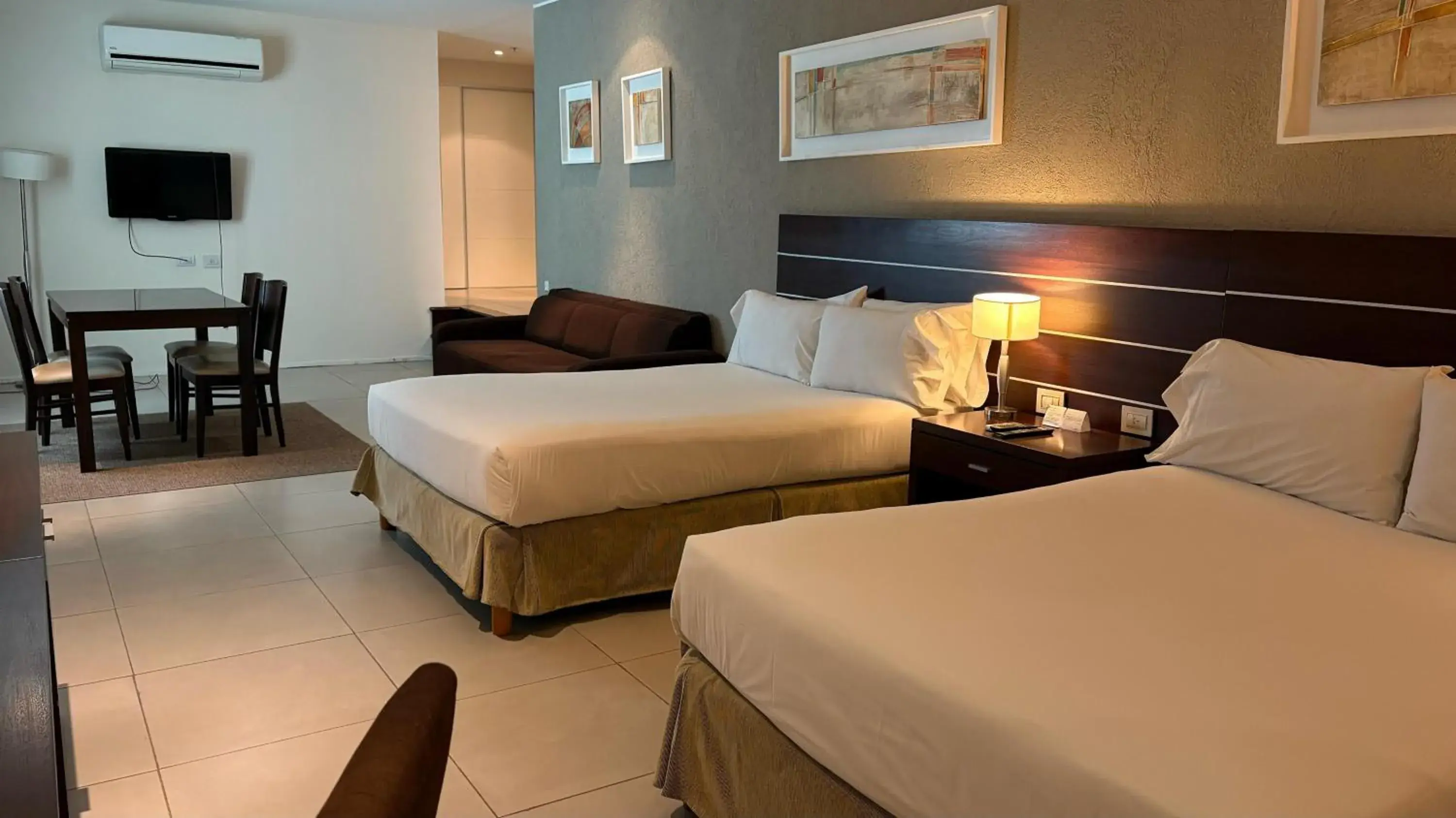 Bed in Orfeo Suites Cordoba Bed in Orfeo Suites Cordoba