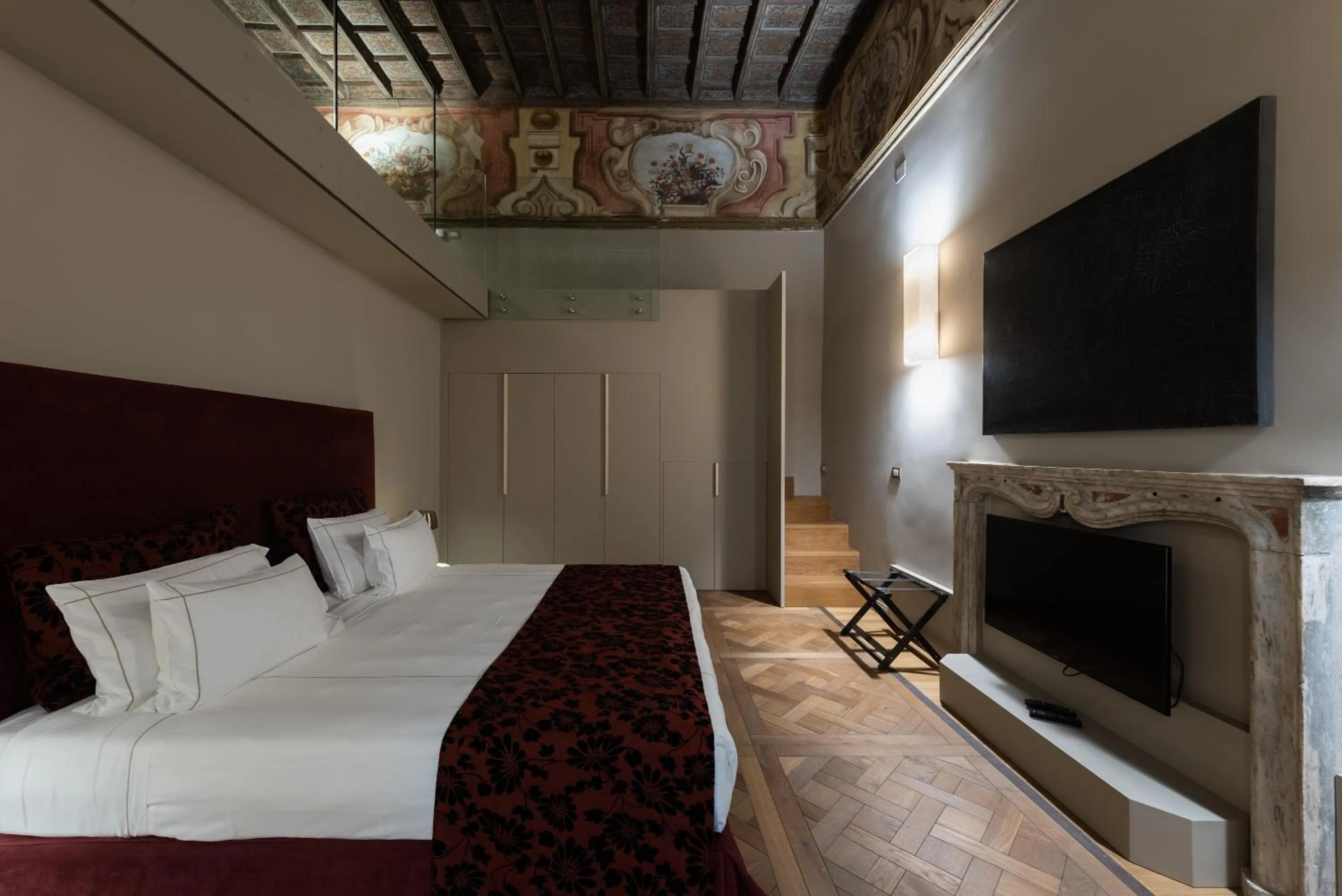 Bed in Palazzo Del Carretto-Art Apartments and Guesthouse