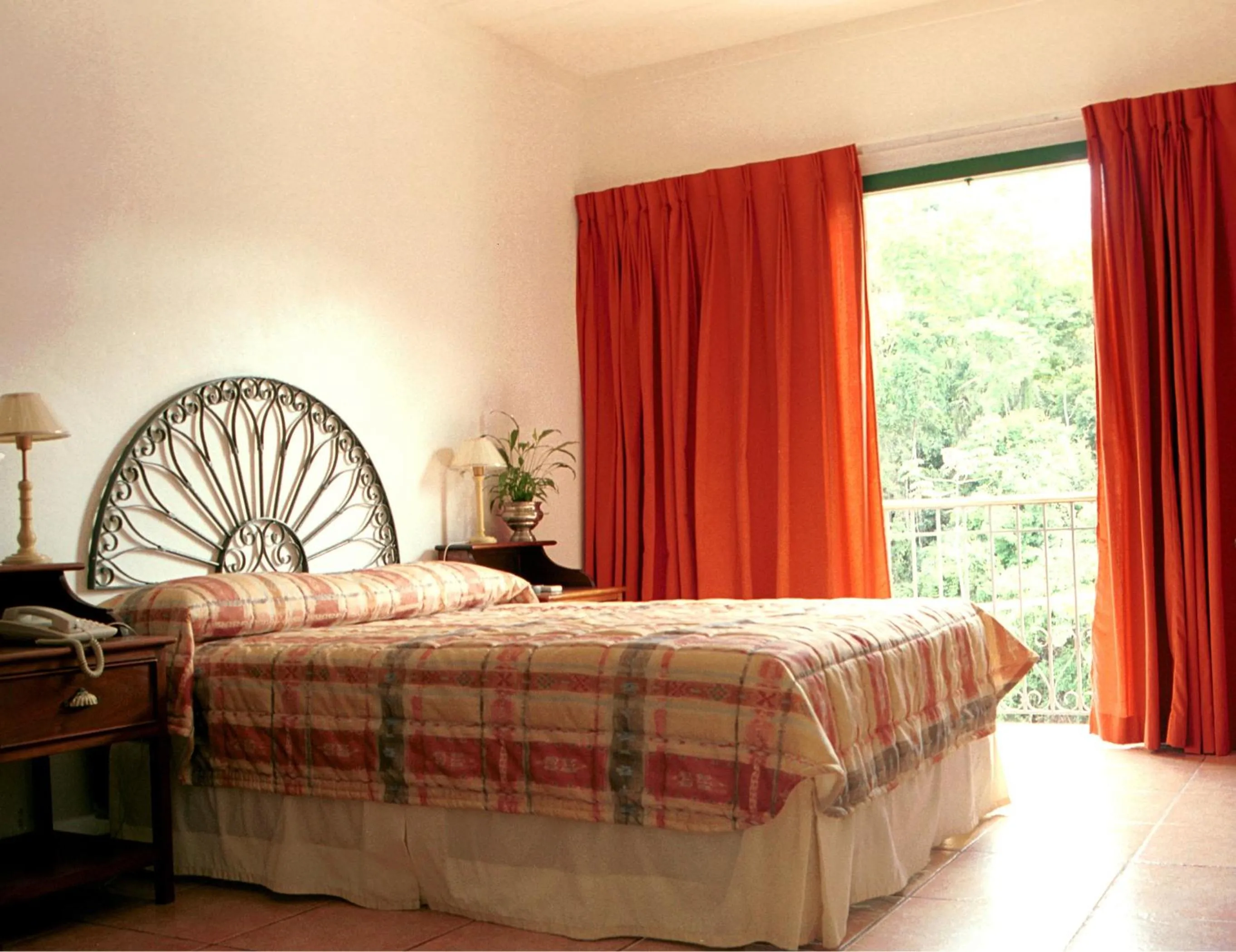 Bed in Casa do Manequinho Hotel e Restaurante