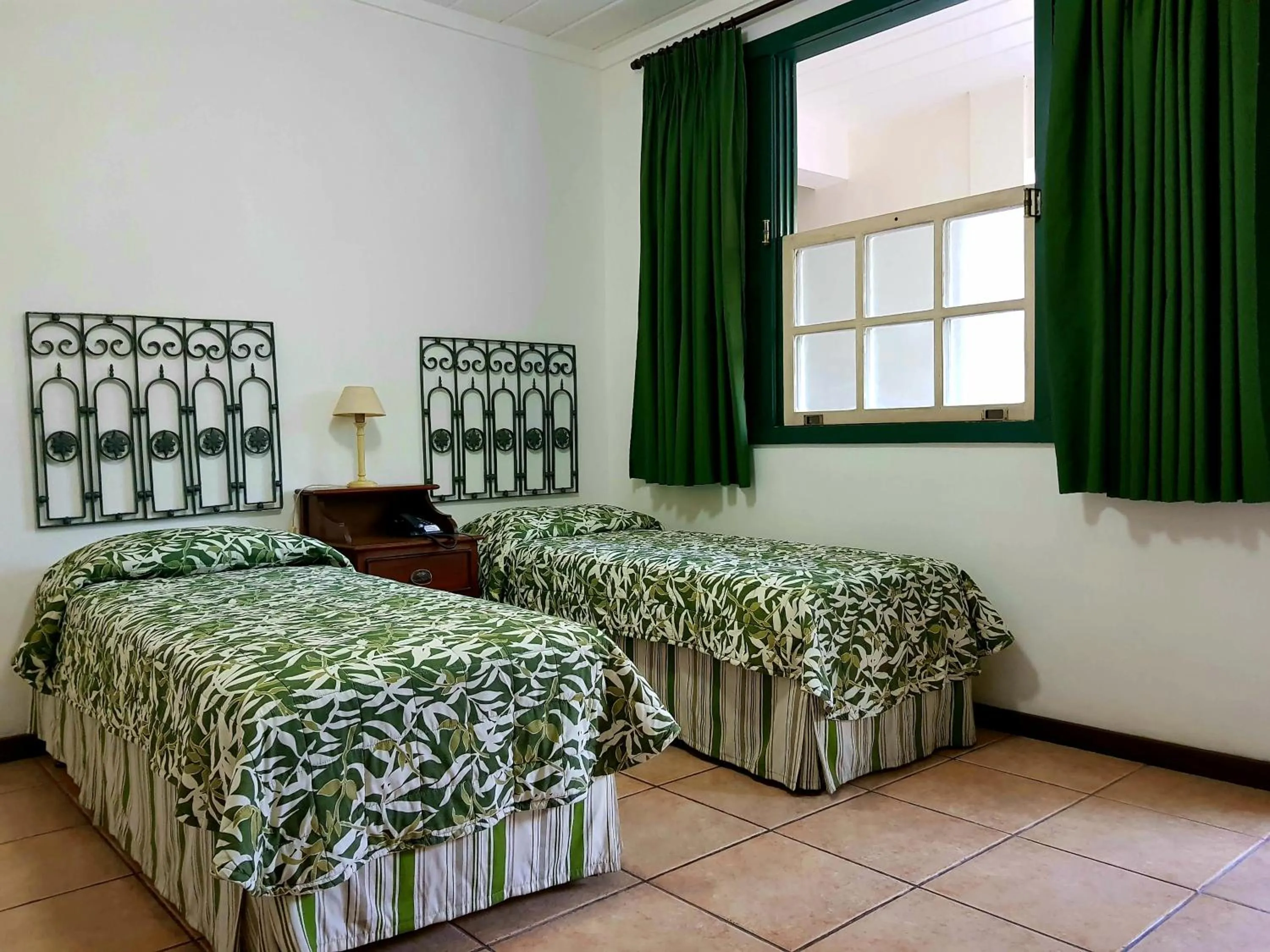 Bed in Casa do Manequinho Hotel e Restaurante