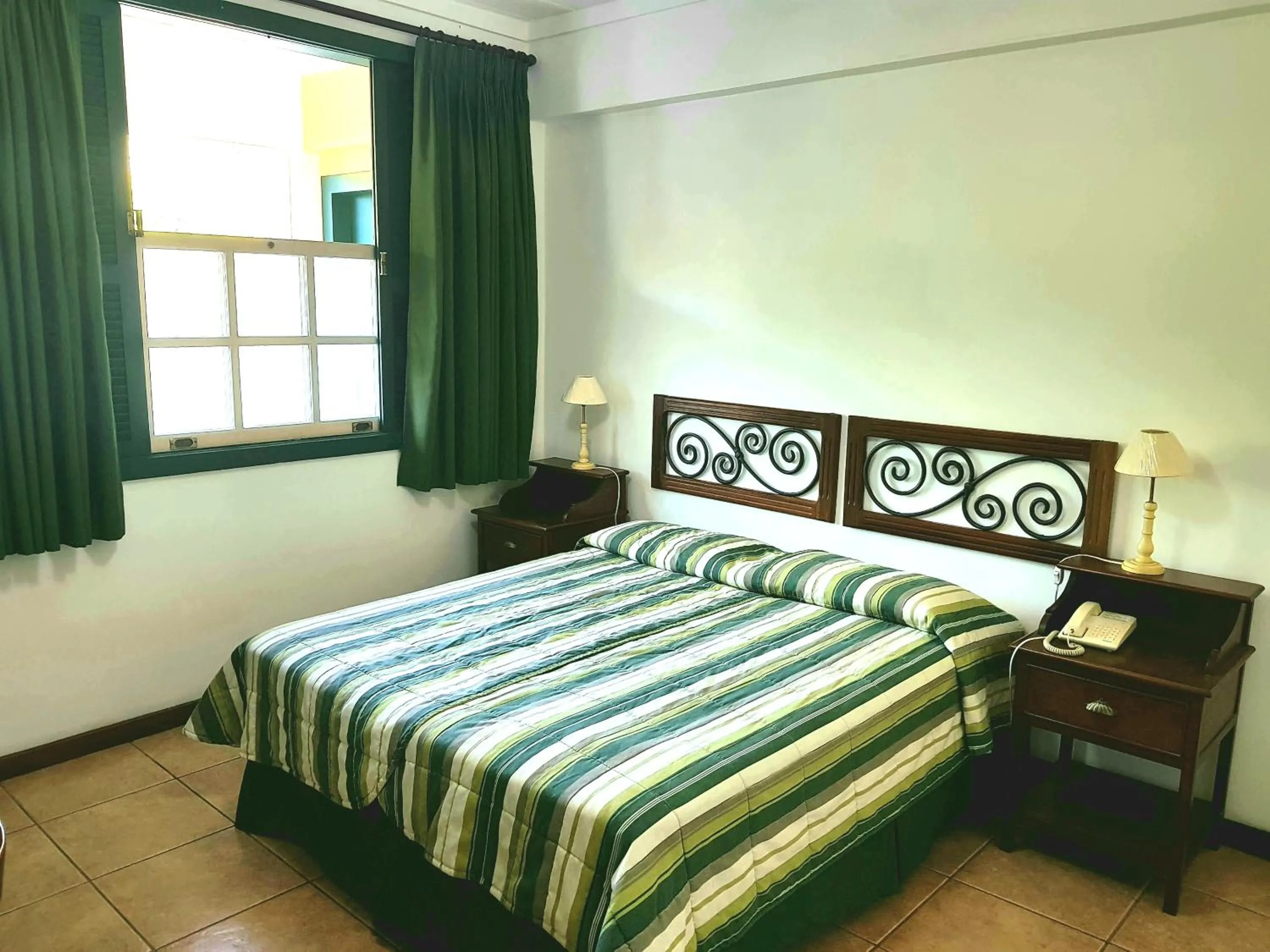 Bed in Casa do Manequinho Hotel e Restaurante