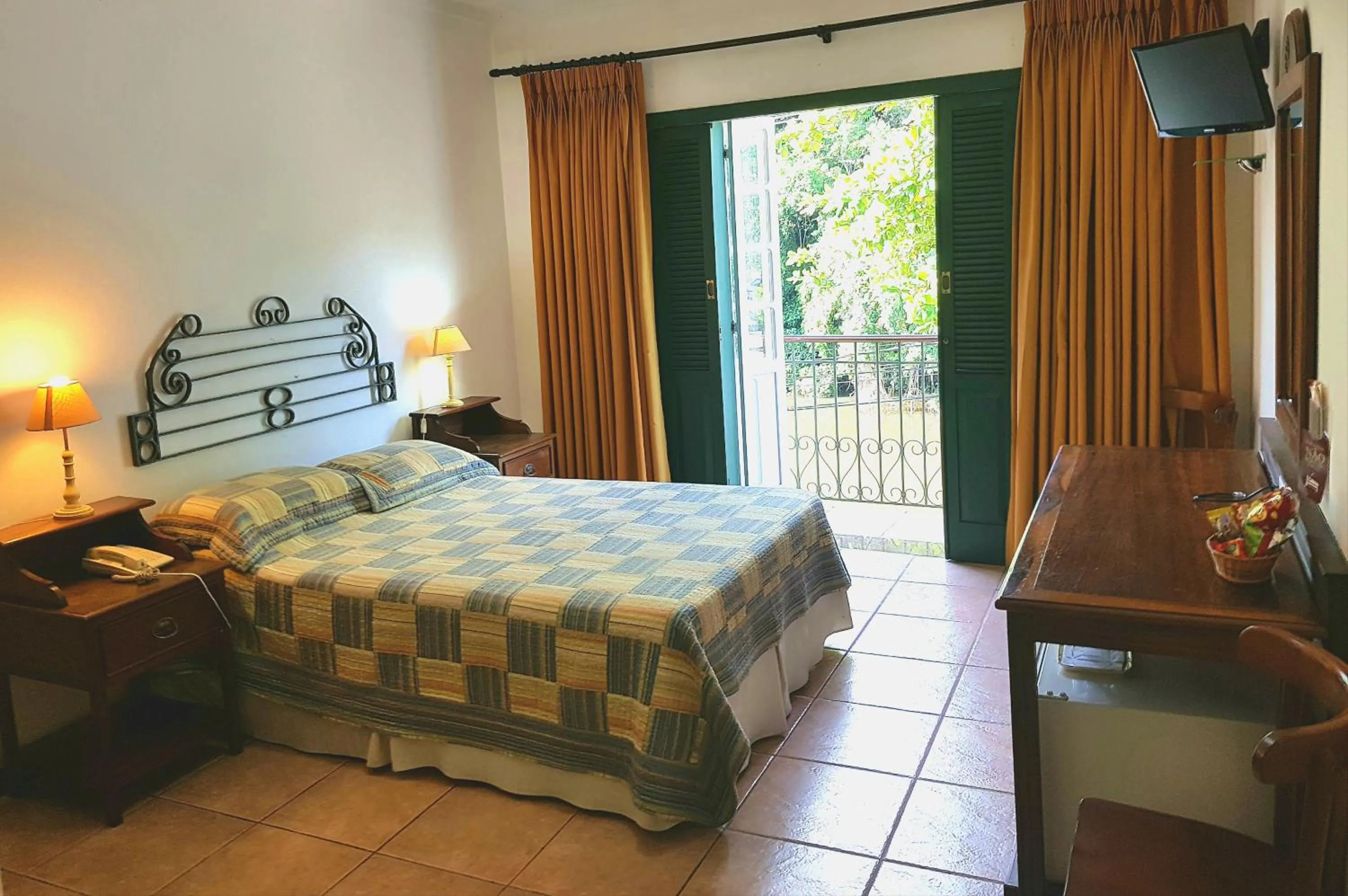 Bed in Casa do Manequinho Hotel e Restaurante
