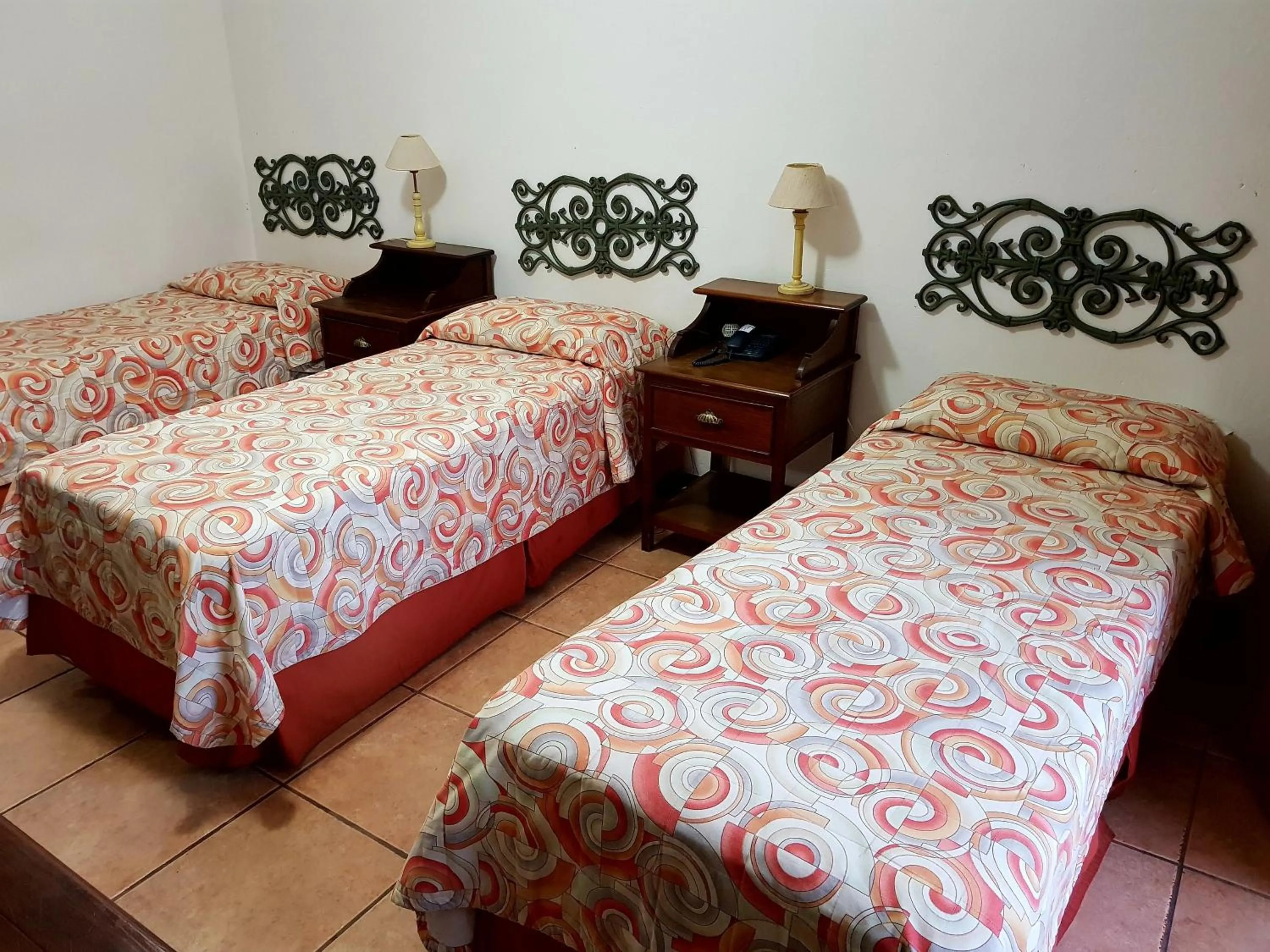 Bed in Casa do Manequinho Hotel e Restaurante