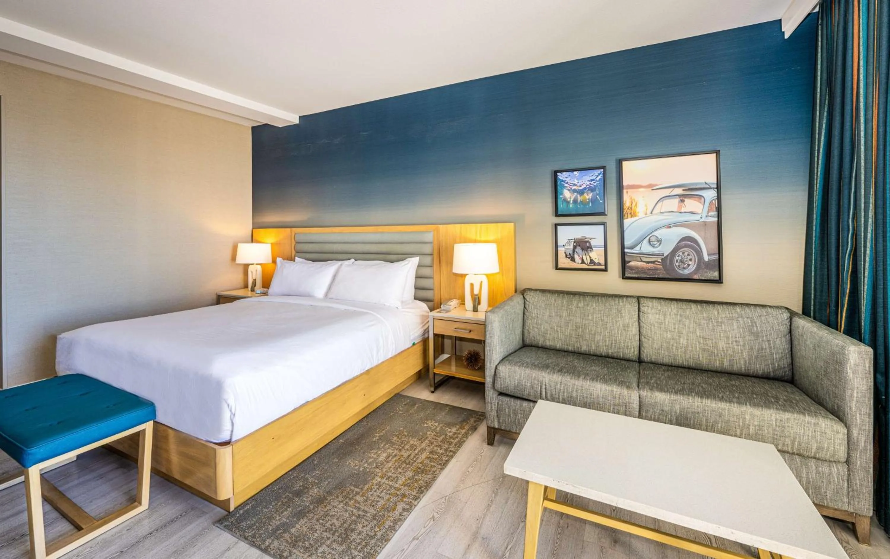 Living room, Bed in Inn at the Pier Pismo Beach, Curio Collection by Hilton