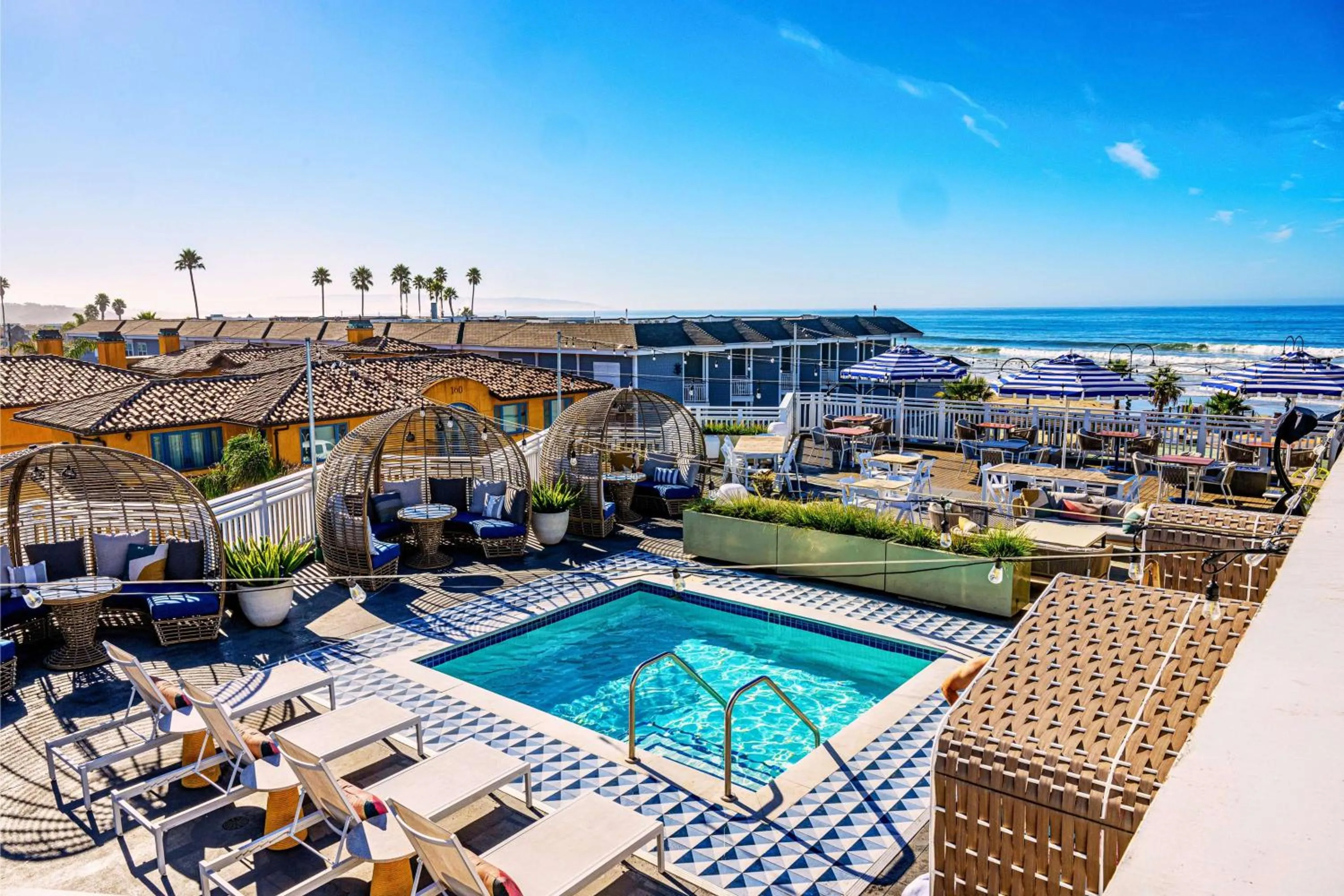 Pool view in Inn at the Pier Pismo Beach, Curio Collection by Hilton