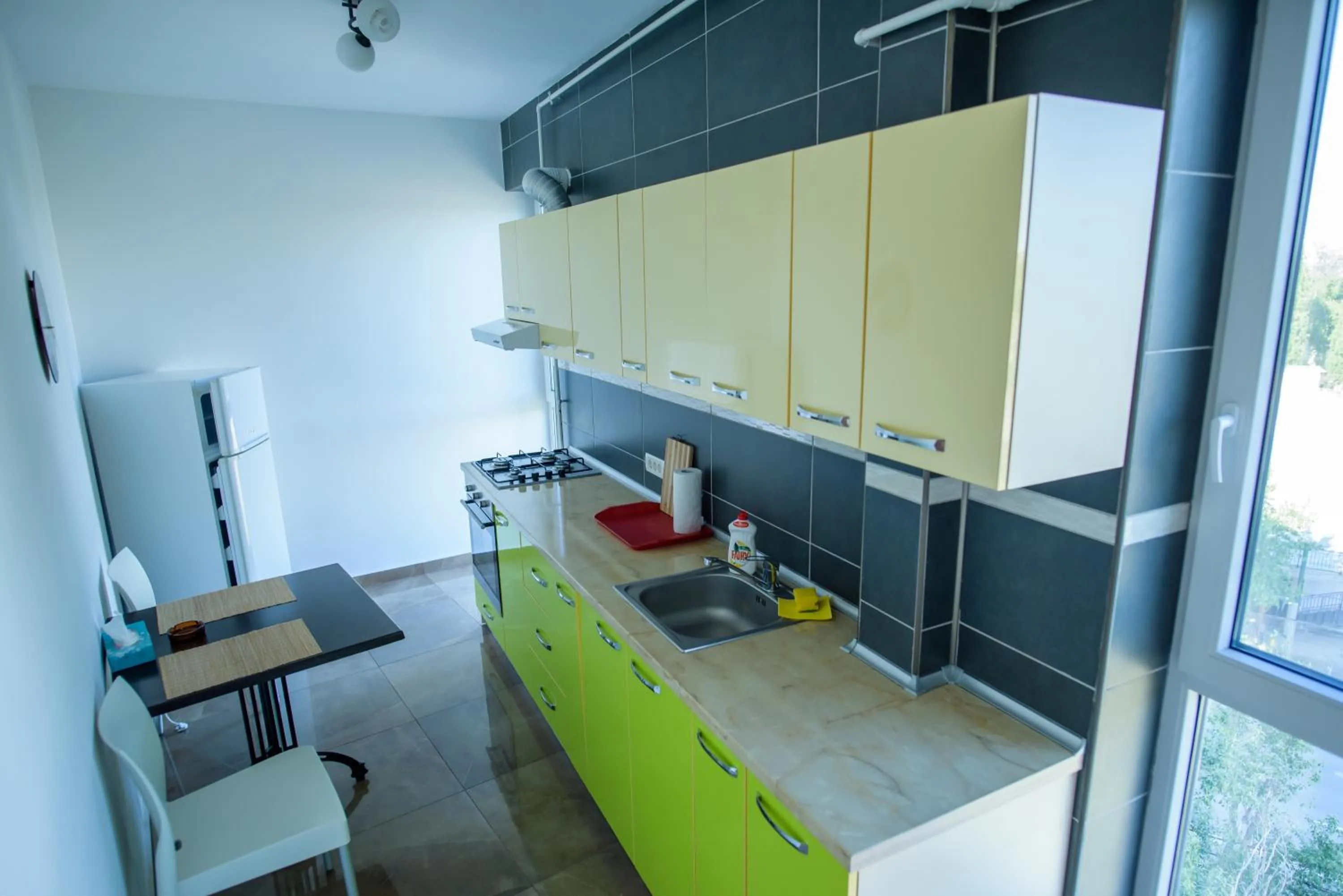 Kitchen or kitchenette in C&Y Apartments Aqua Park